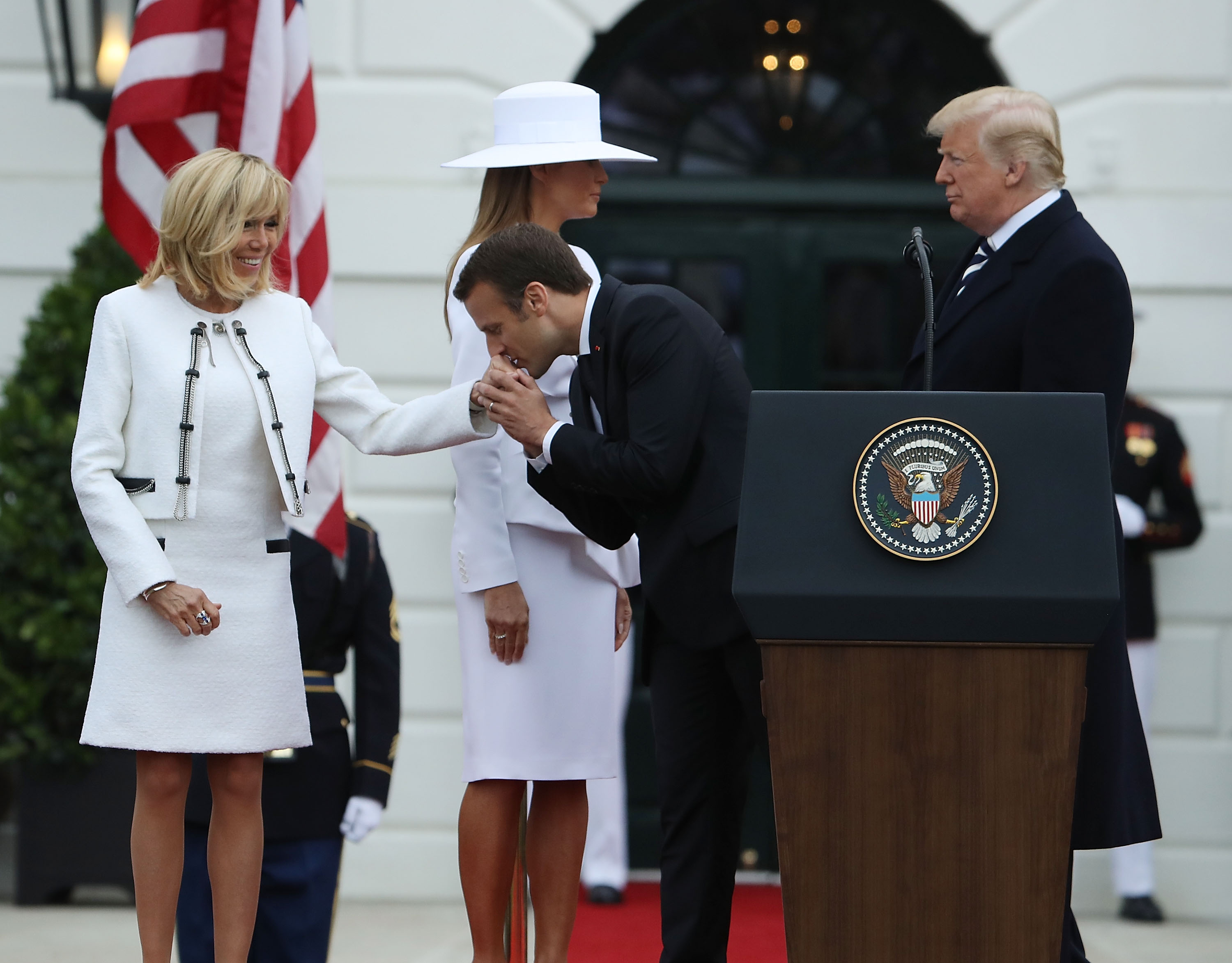 During a formal welcome at the White House on April 24, 2018, President Emmanuel kissed Brigitte's hand in front of President Donald Trump and First Lady Melania Trump. The moment stood out as a rare display of personal formality between the French first couple on an international stage.