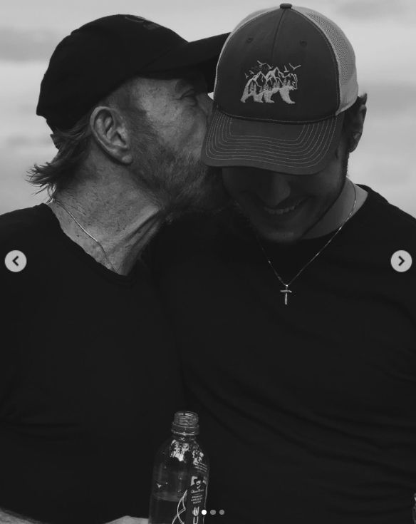 Chuck Norris shares a candid father-son moment with Dakota | Source: Instagram/d.ak.ot.a