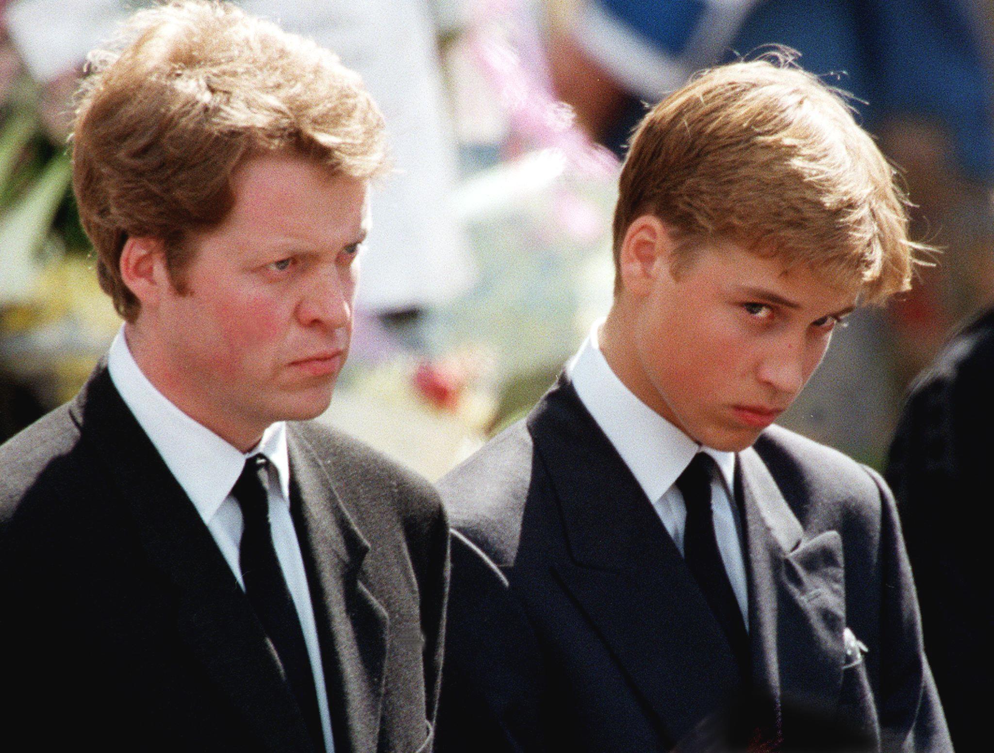Prince William and her uncle Charles, Earl Spencer wait in front of Westminster Abbey to attend the funeral ceremony of Princess Diana on September 6, 1997 in London | Source: Getty Images