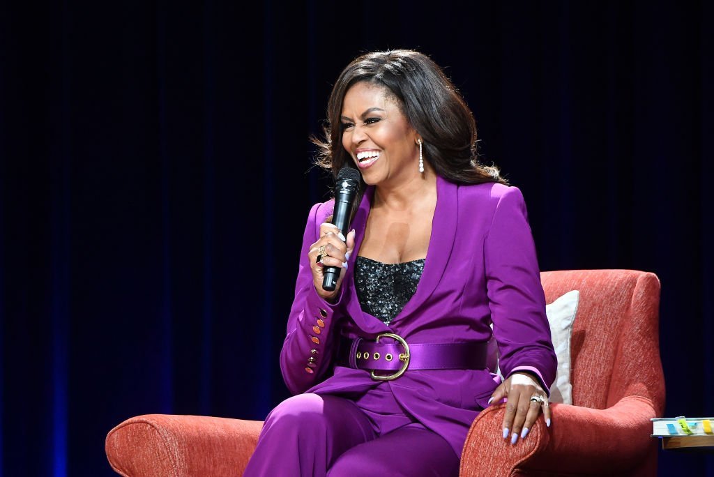 Source: Getty Images / Michell Obama at “Becoming: An Intimate Conversation with Michelle Obama” book tour stop at the State Farm Arena, Atlanta on May 11, 2019