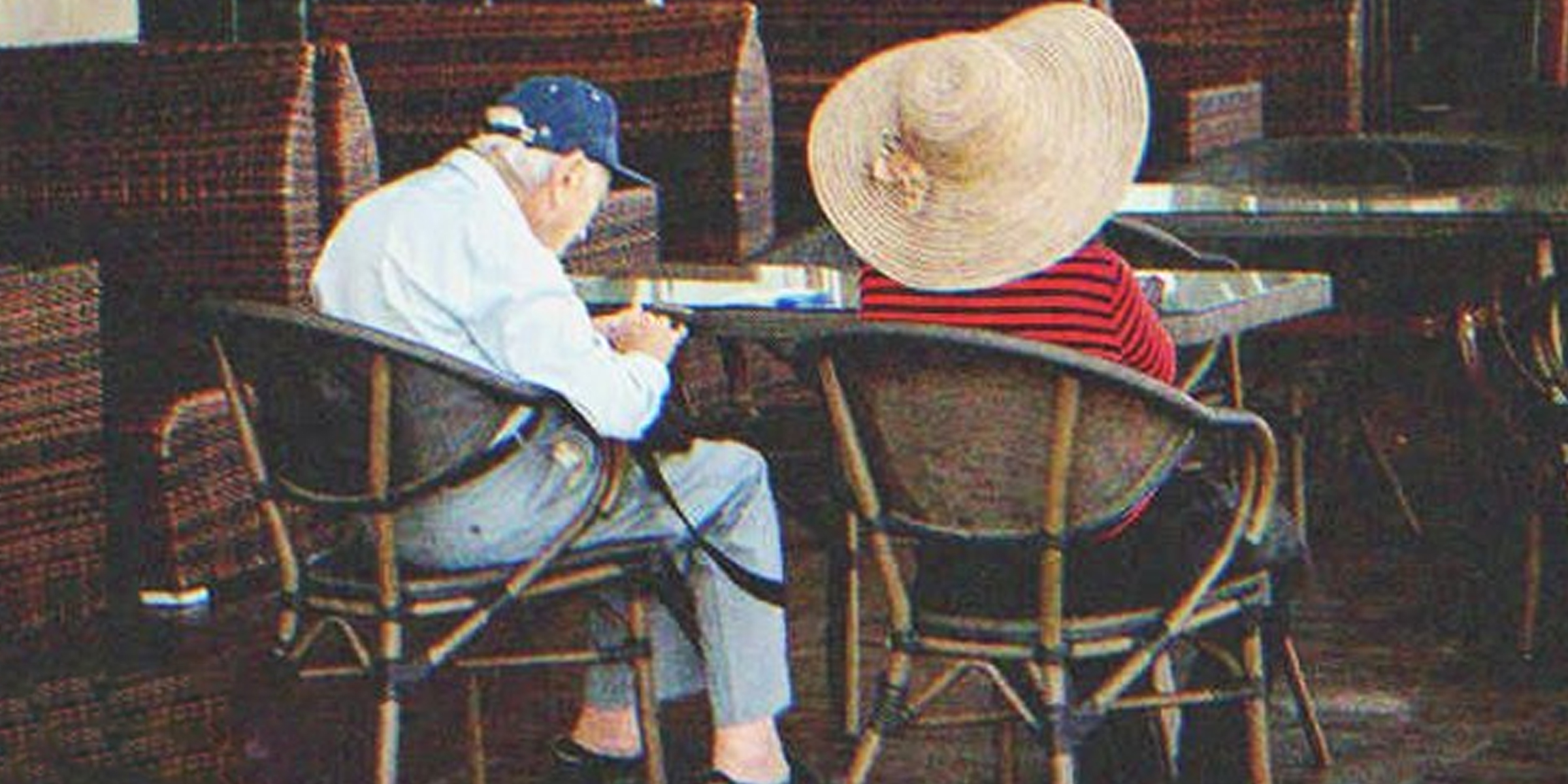 A couple of elders sitting in a restaurant | Source: Shutterstock