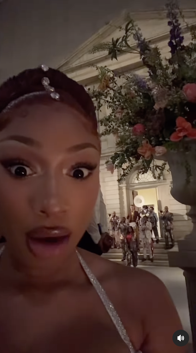 A shocked Megan Thee Stallion is pictured recording a video of herself at the Met Gala, dated May 6, 2025 | Source: Instagram/A photo of Megan Thee Stallion, dated May 6, 2025 | Source: Instagram/theestallion
