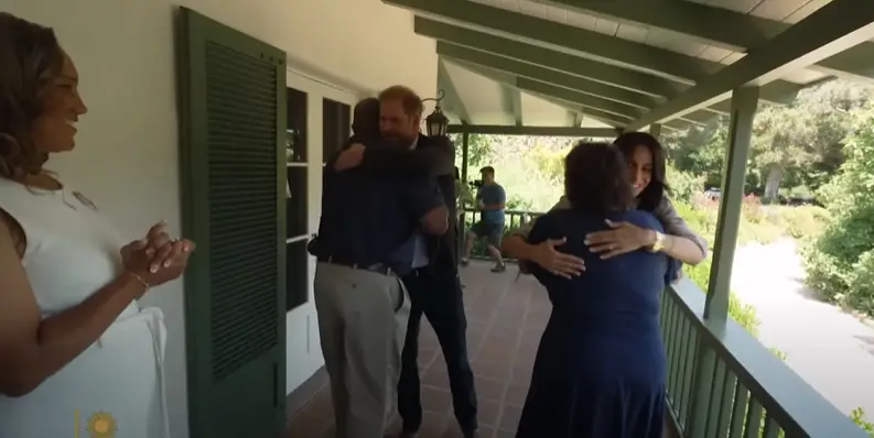 Prince Harry and Meghan Markle greeting the parents part of The Parents Network. | Source: YouTube/CBS Sunday Morning