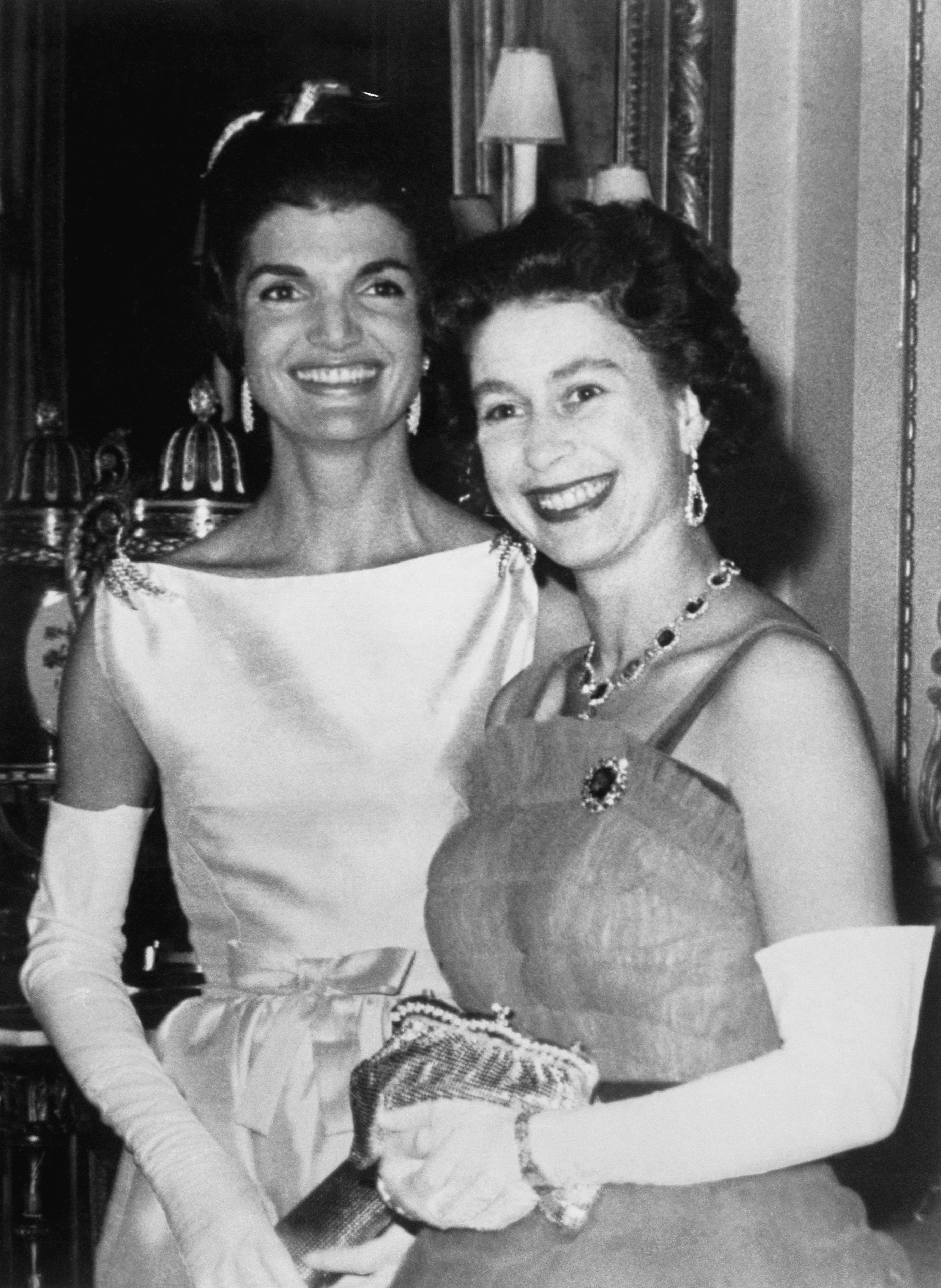 Queen Elizabeth and Jacqueline Kennedy after dinner at Buckingham Palace here June 5, 1918. | Source: Getty Images