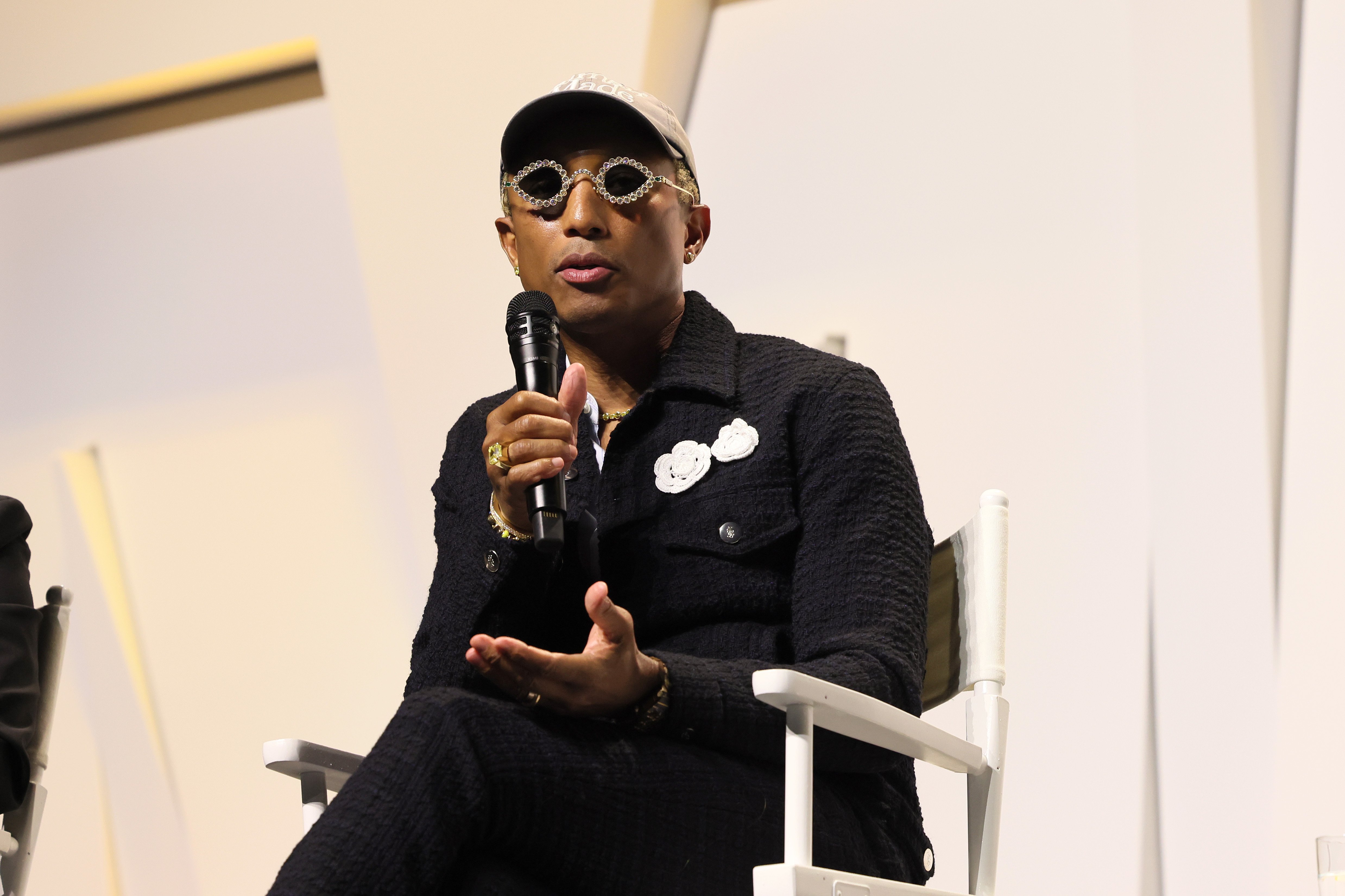Pharrell Williams speaks onstage during the Mighty Dream Forum on November 03, 2022, in Norfolk, Virginia. | Source: Getty Images