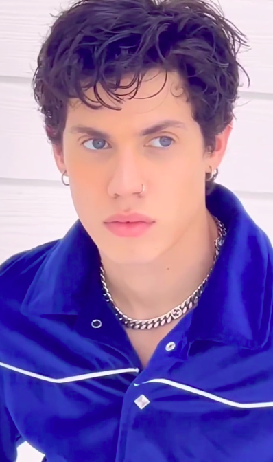 Ryan Muñiz posing during a photoshoot, from a reel posted on January 2, 2024 | Source: Instagram/revistaellas