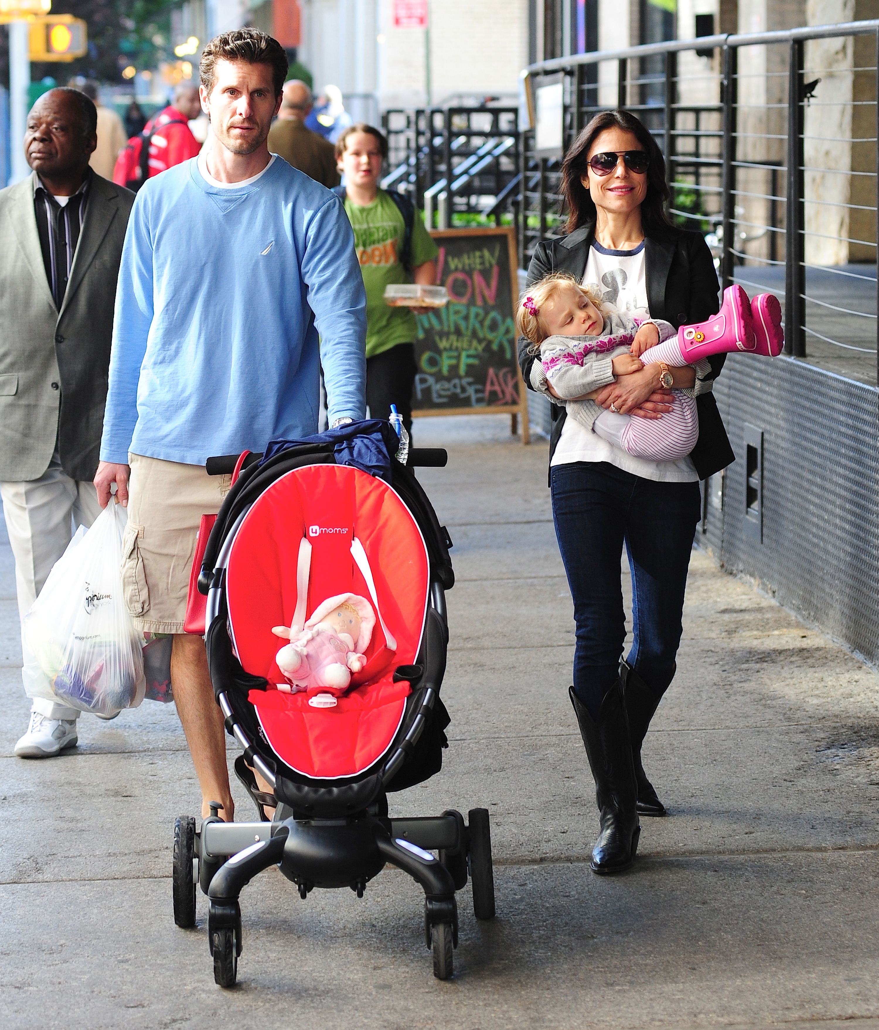 Jason Hoppy, Bethenny Frankel and Bryn Hoppy are seen on May 1, 2012, in New York City | Source: Getty Images