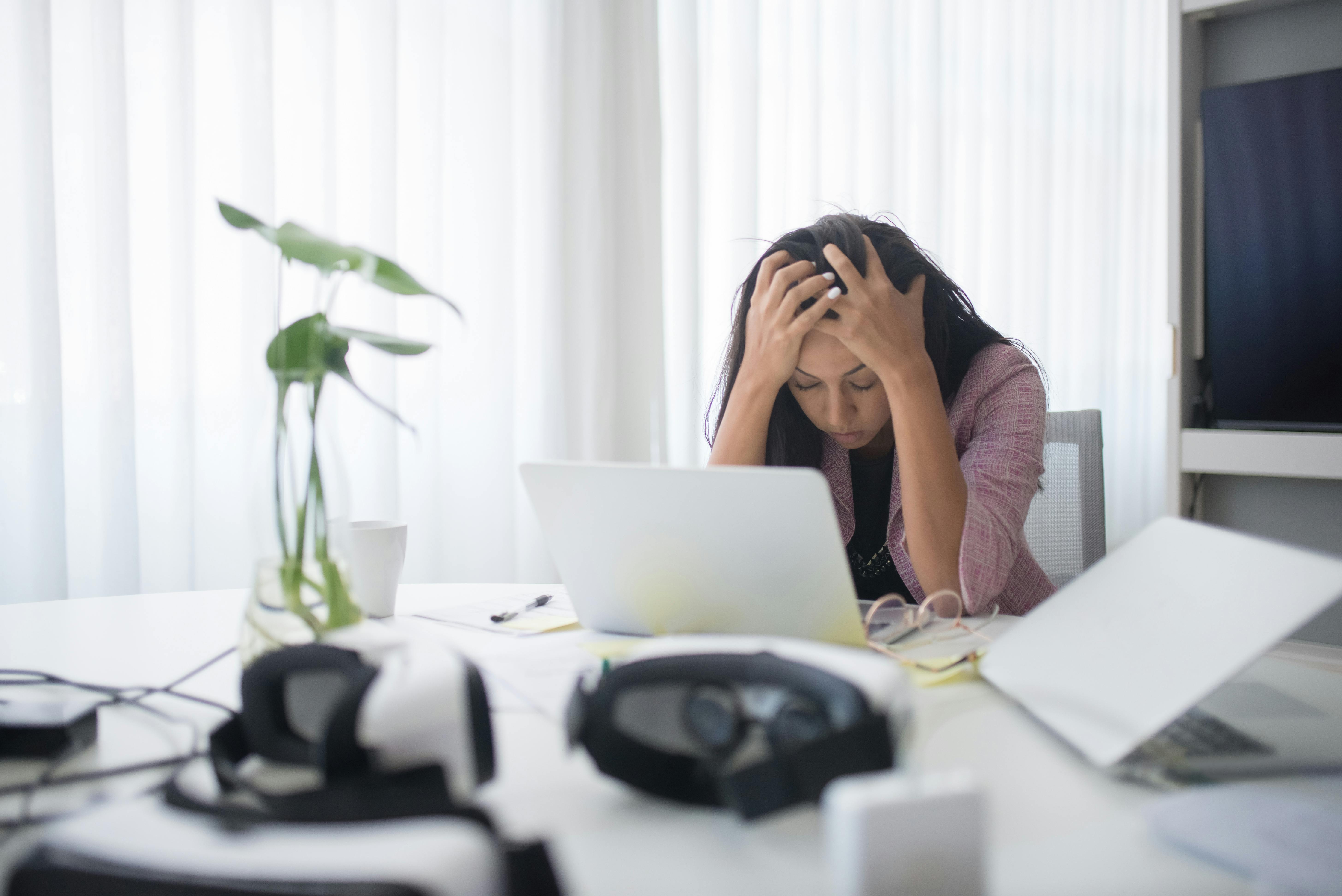 A stressed woman at work | Source: Pexels