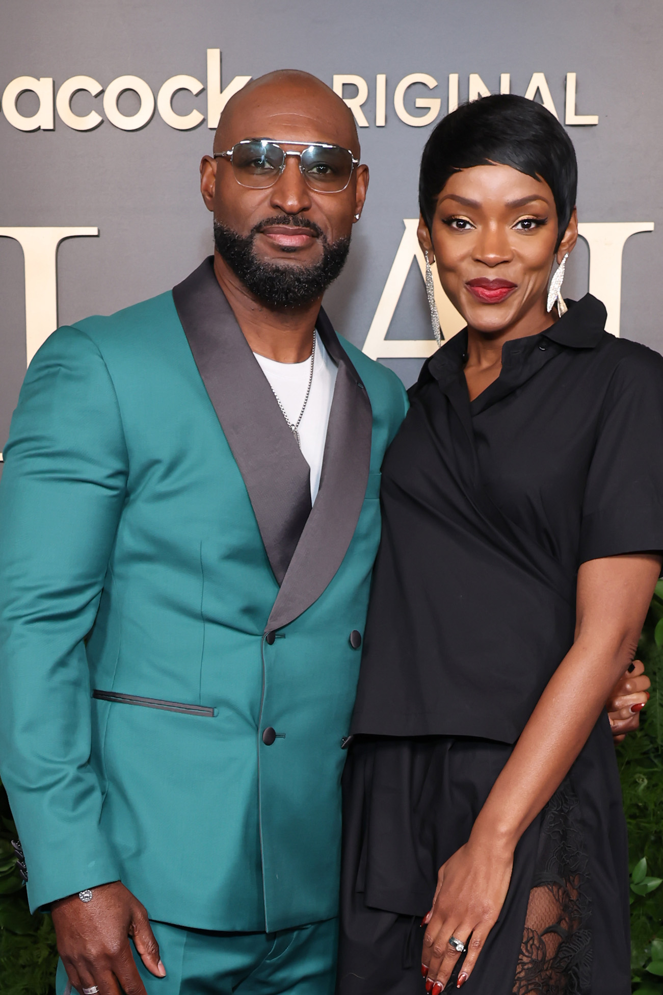 Adrian Holmes and Caroline Chikezie at the premiere of season 2 of "Bel-Air" on February 22, 2023, in Hollywood, California. | Source: Getty Images