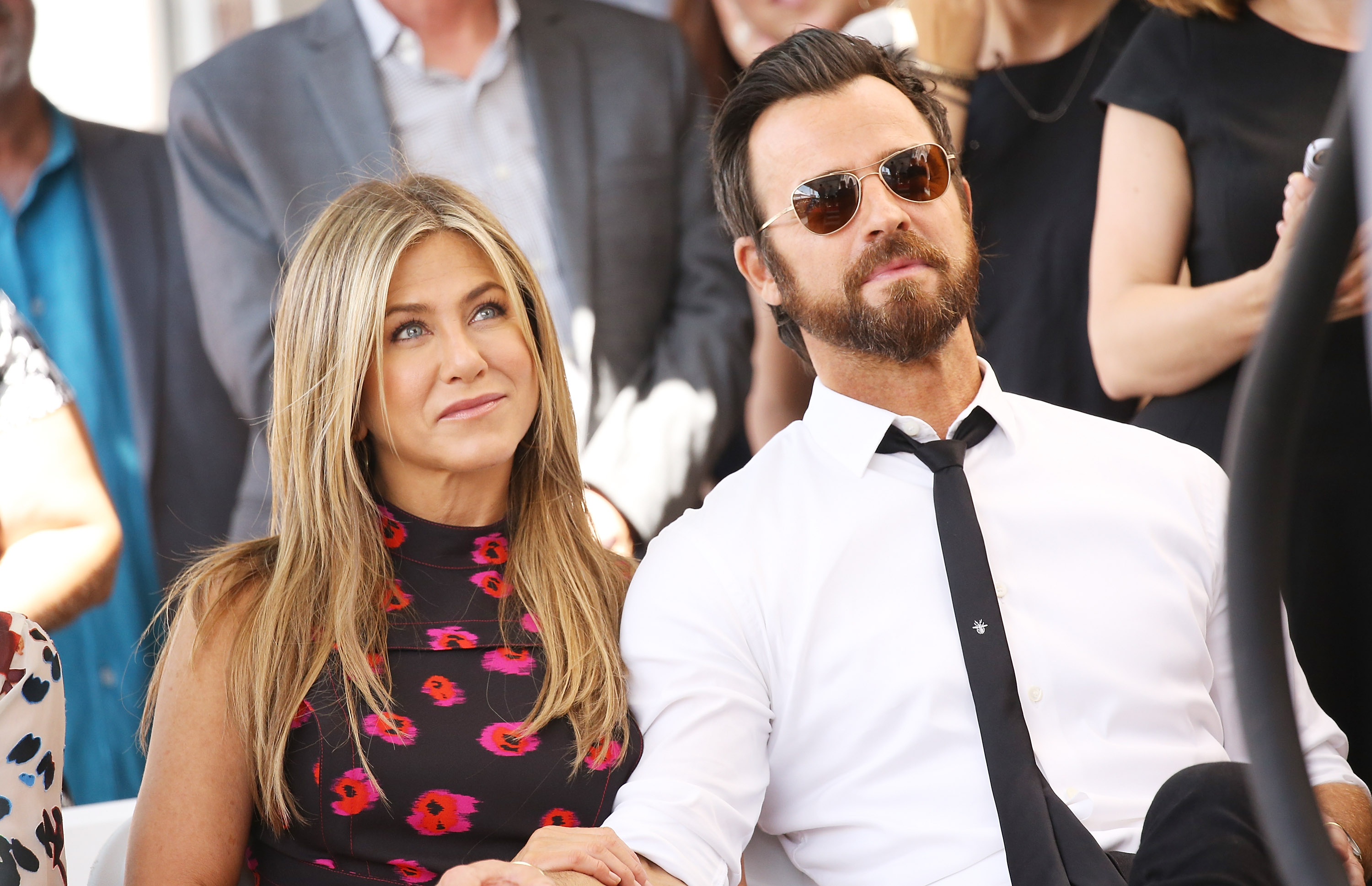 Jennifer Aniston and Justin Theroux at the ceremony honoring Jason Bateman with a Star on The Hollywood Walk of Fame on July 26, 2017, in Hollywood, California. | Source: Getty Images