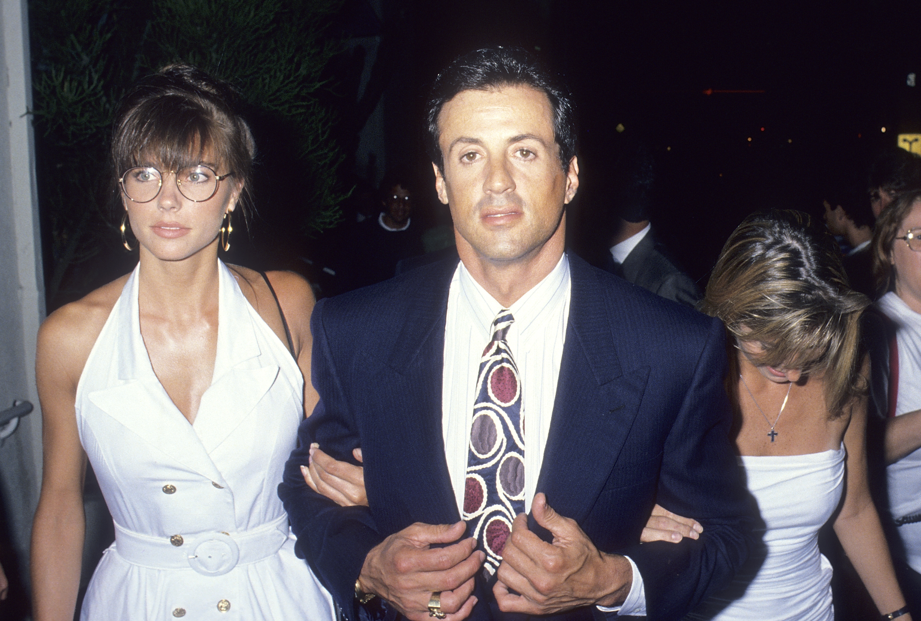 Jennifer Flavin and her boyfriend Sylvester Stallone dine at Spago in West Hollywood, California, on July 6, 1989 | Source: Getty Images