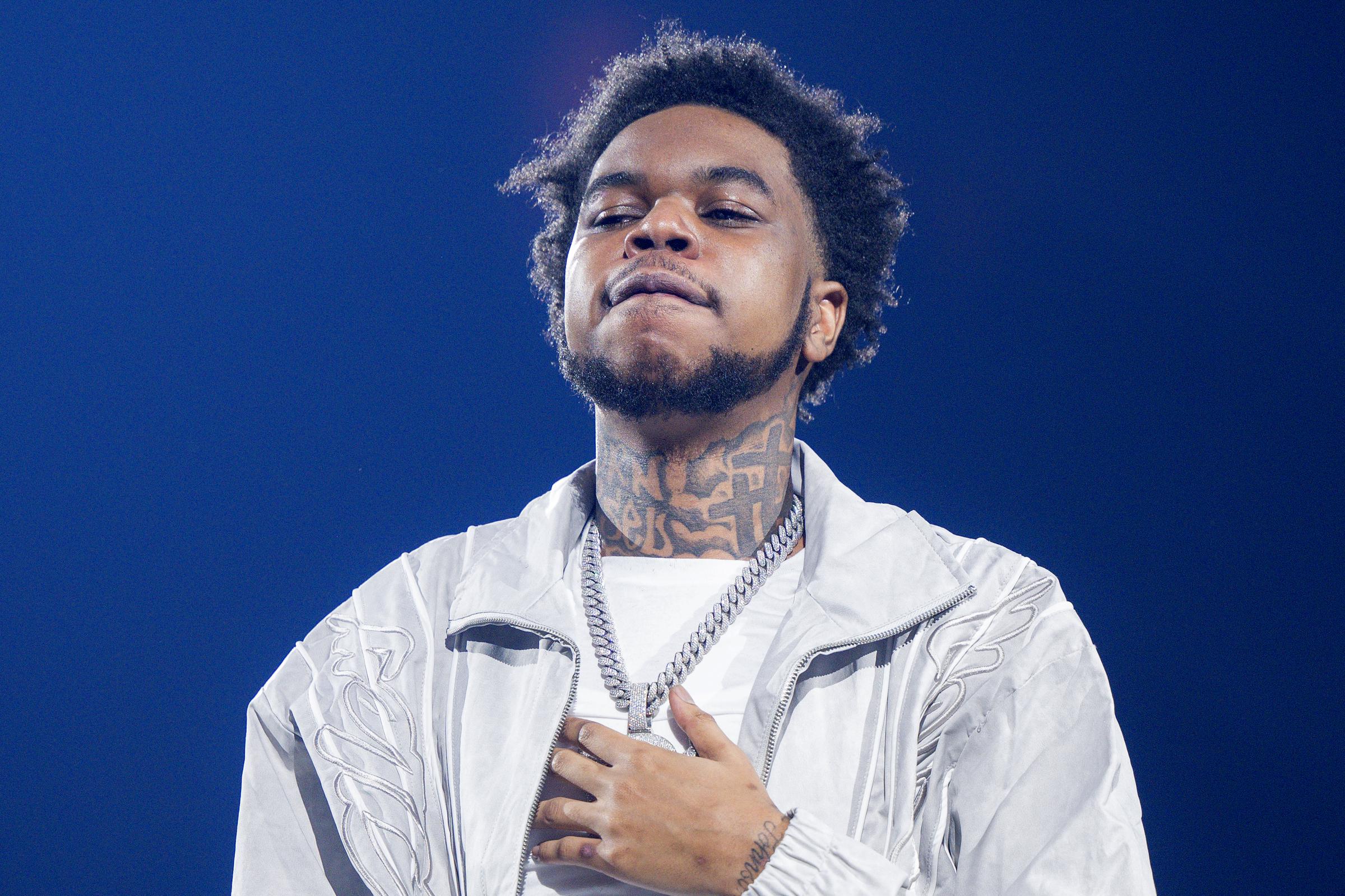 Lil Poppa looks on at the crowd at the Toyota Center in Houston, Texas on October 31, 2024. | Source: Getty Images