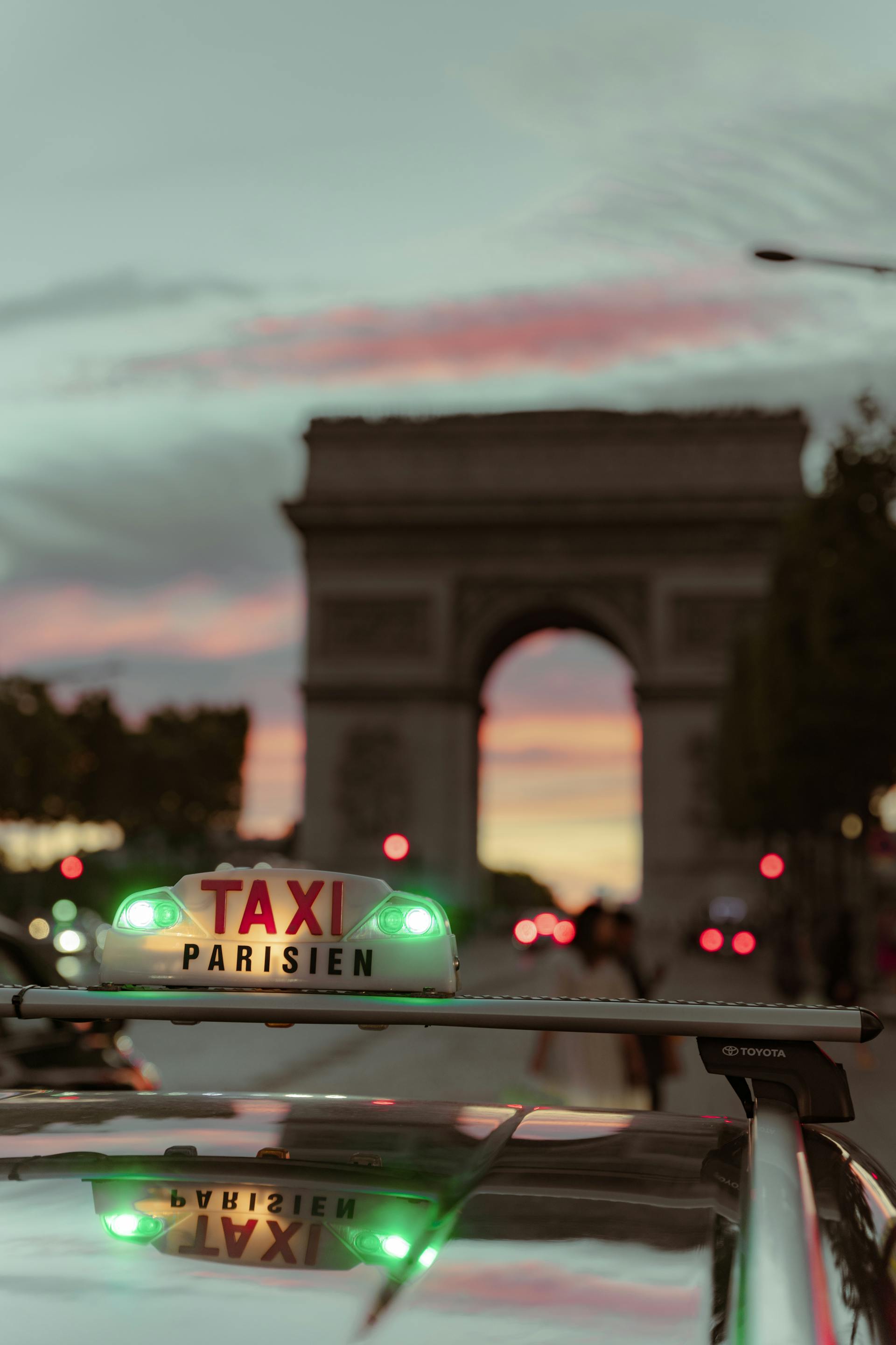 Close-up of a taxi at the Arc de Triomphe in Paris, France | Source: Pexels