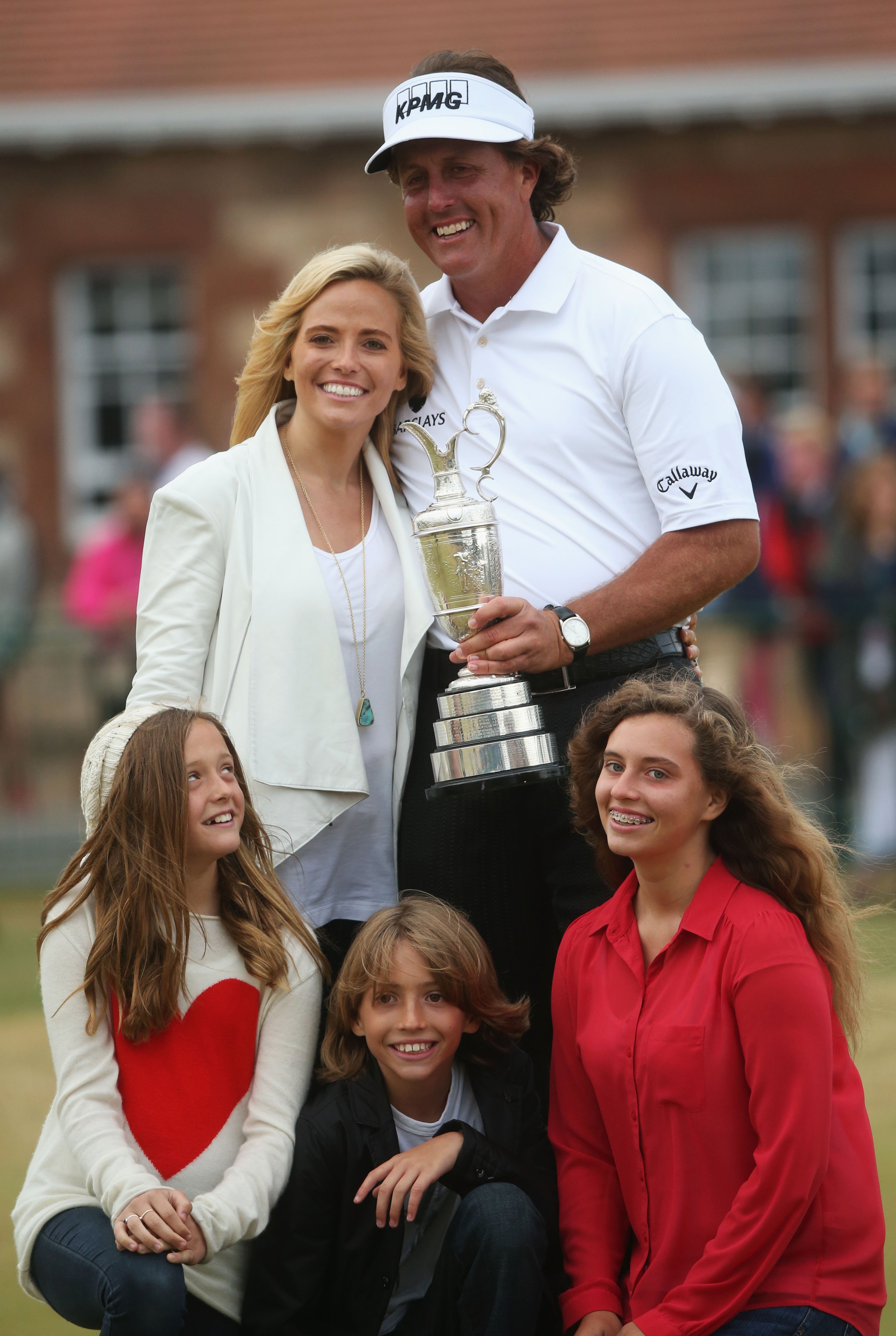 Phil Mickelson and Amy Mickelson with their children following Phil's win at the 142nd Open Championship on July 21, 2013, in Gullane, Scotland. | Source: Getty Images