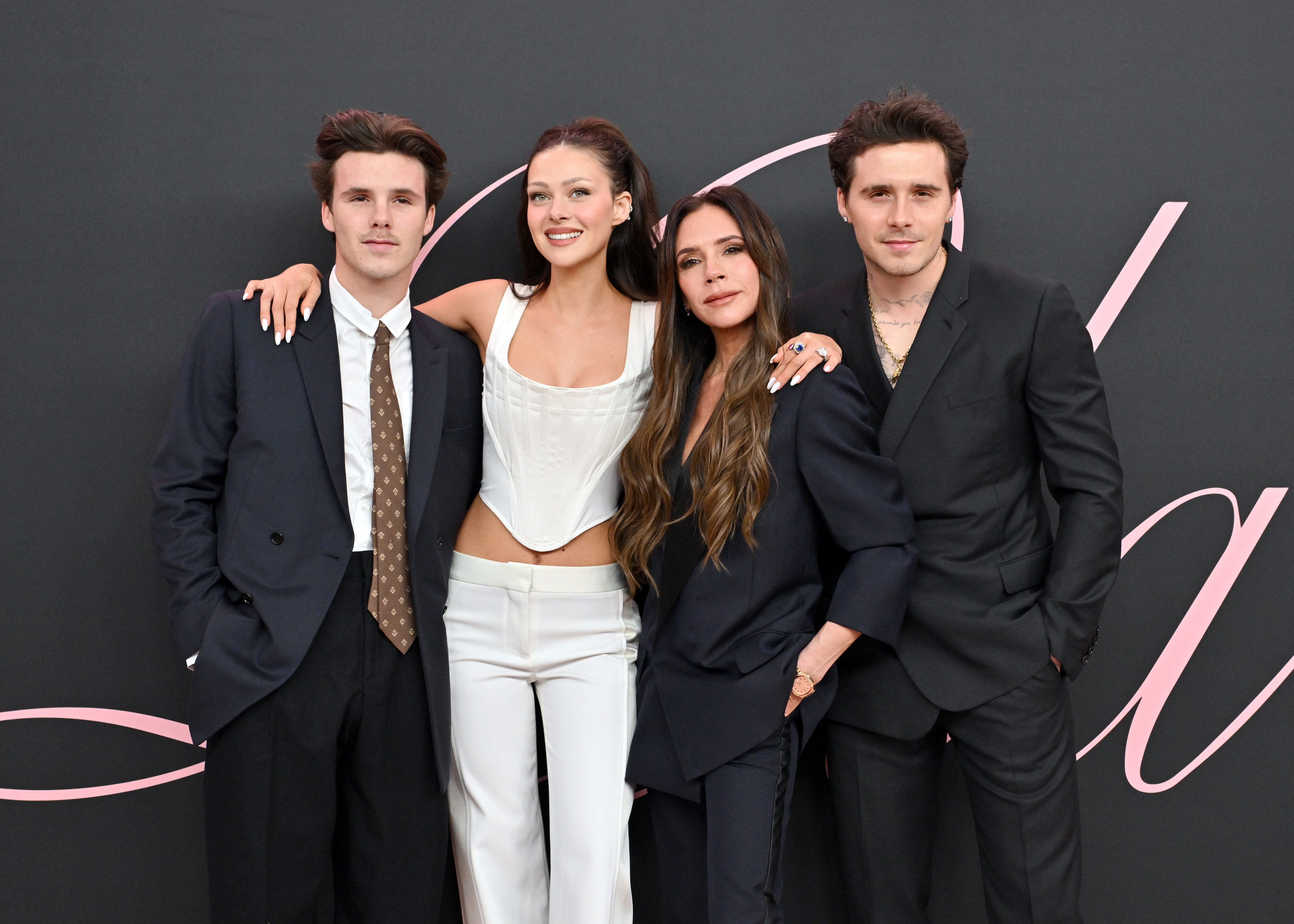 Cruz and Victoria Beckham with Nicola and Brooklyn Peltz Beckham at the premiere of "Lola" on February 3, 2024, in Los Angeles, California. | Source: Getty Images