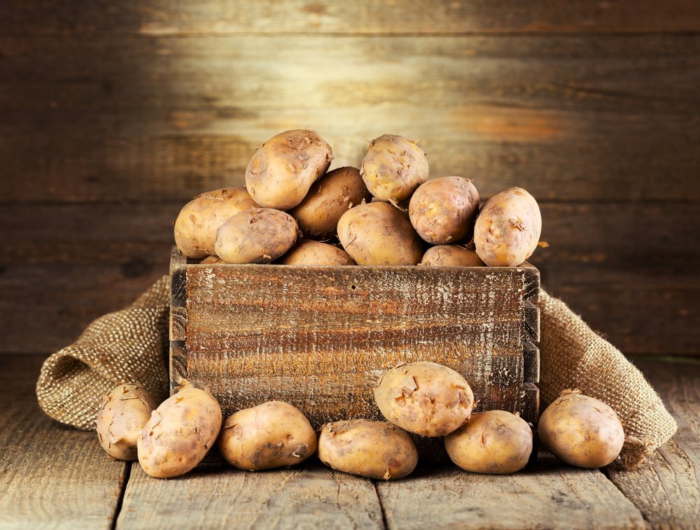 Fresh Potatoes in a Wooden Box | Photo: Shutterstock