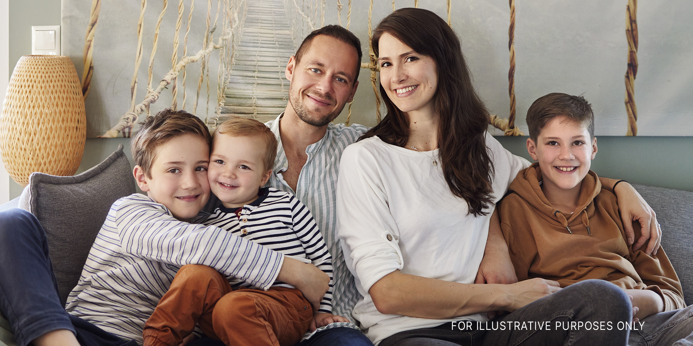 A couple with their three kids | Source: Getty Images