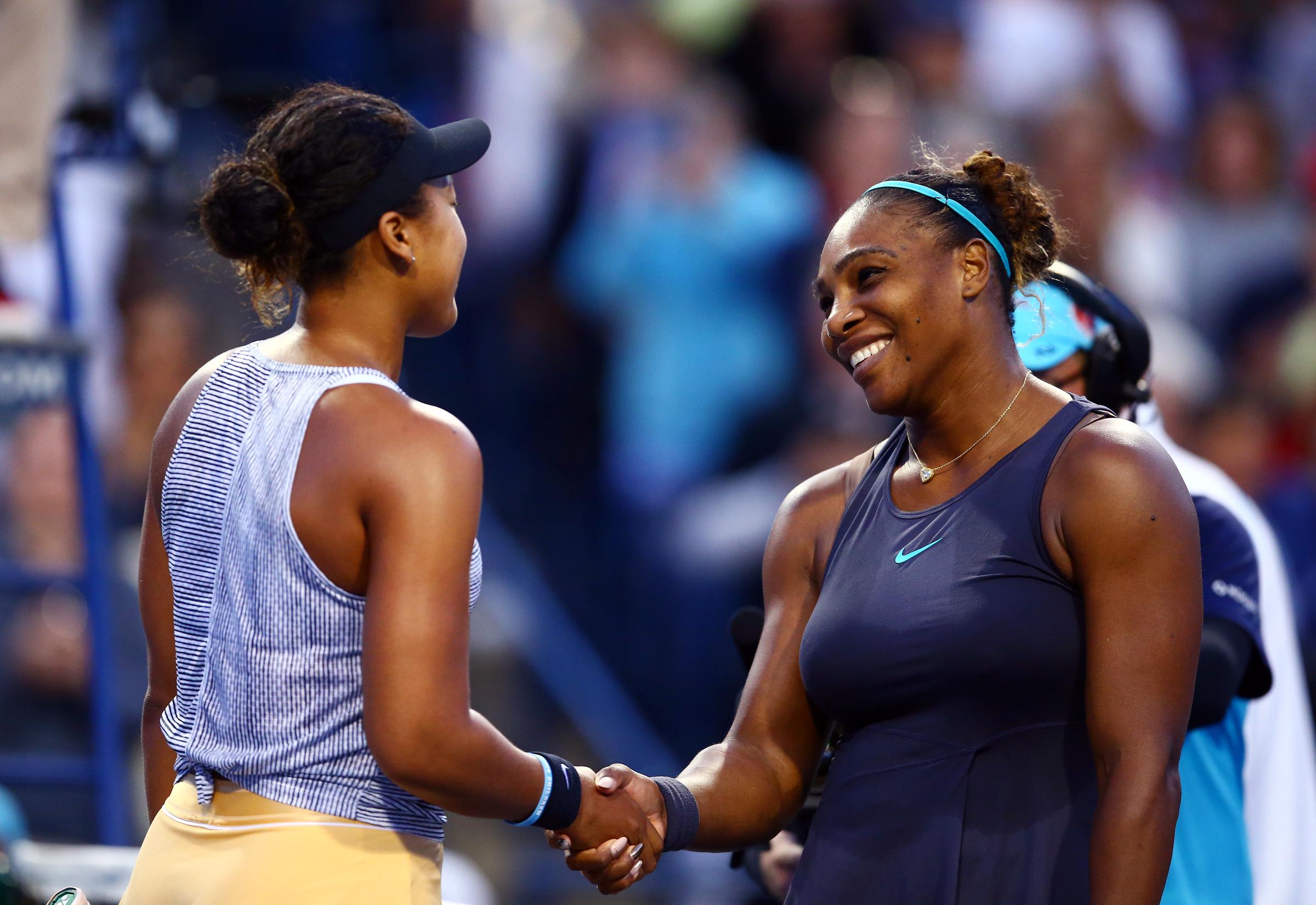 Naomi Osaka and Serena Williams shake hands after a quarterfinal match on Day 7 of the Rogers Cup in Toronto, Canada on August 9, 2019. | Source: Getty Images