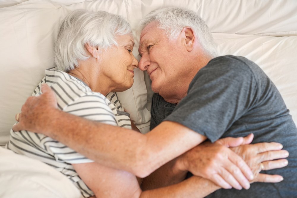 Old couple in bed | Source: Shutterstock