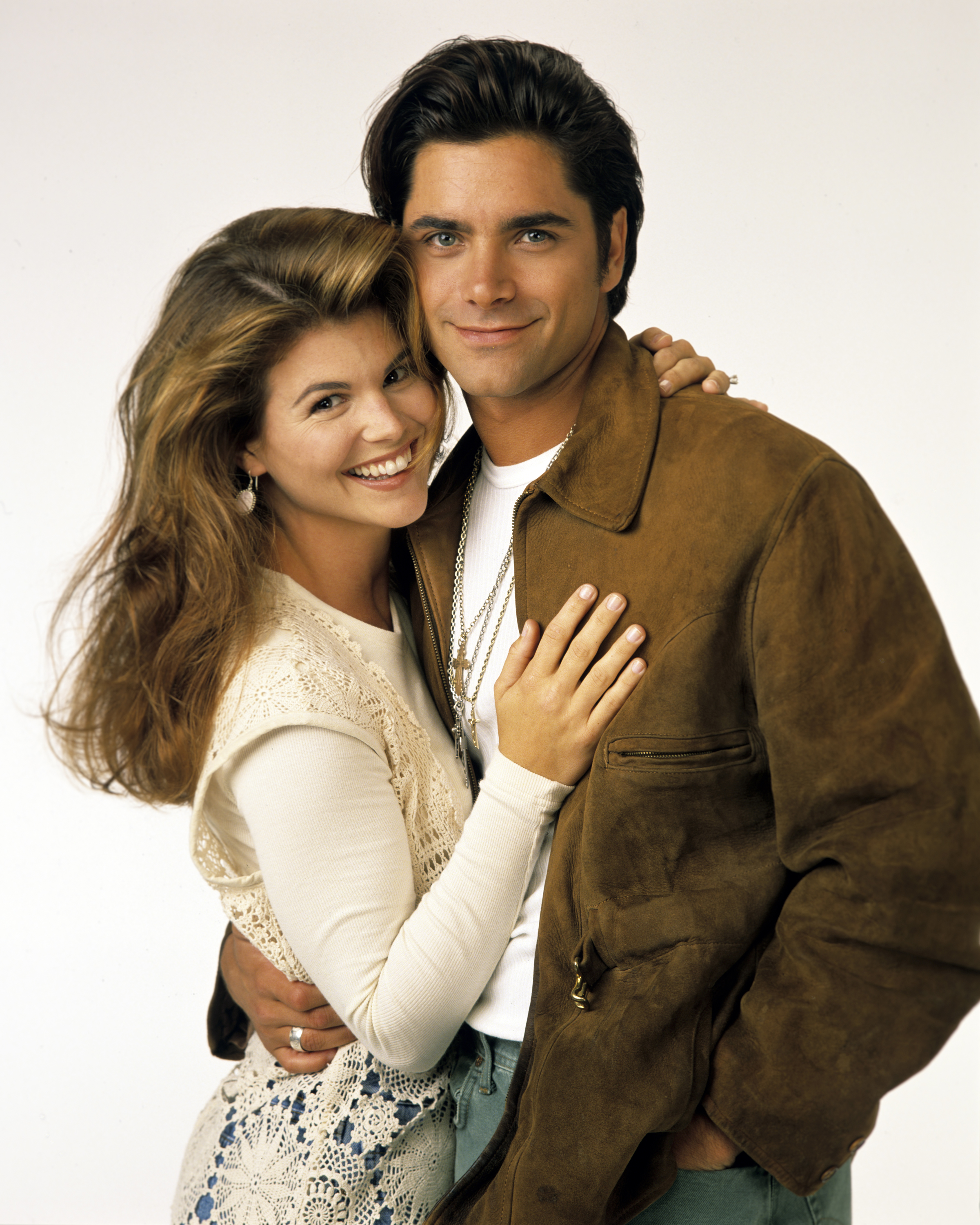 Lori Loughlin as Becky and John Stamos as Jesse on "Full House" on September 14, 1993 | Source: Getty Images