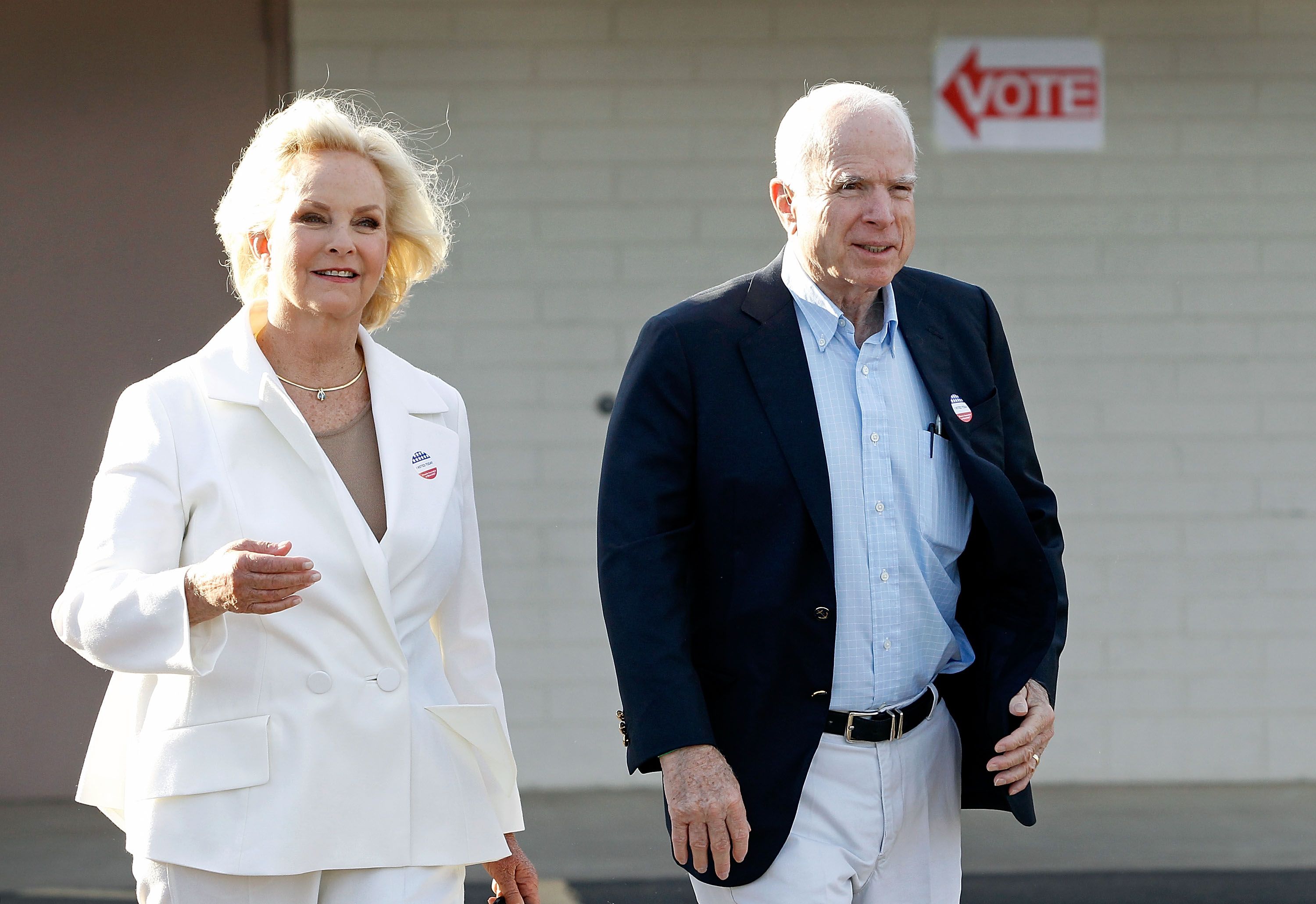 Sen. John McCain and Cindy McCain exit the Mountain View Christian Church polling place after casting their vote on November 8, 2016 | Getty Images