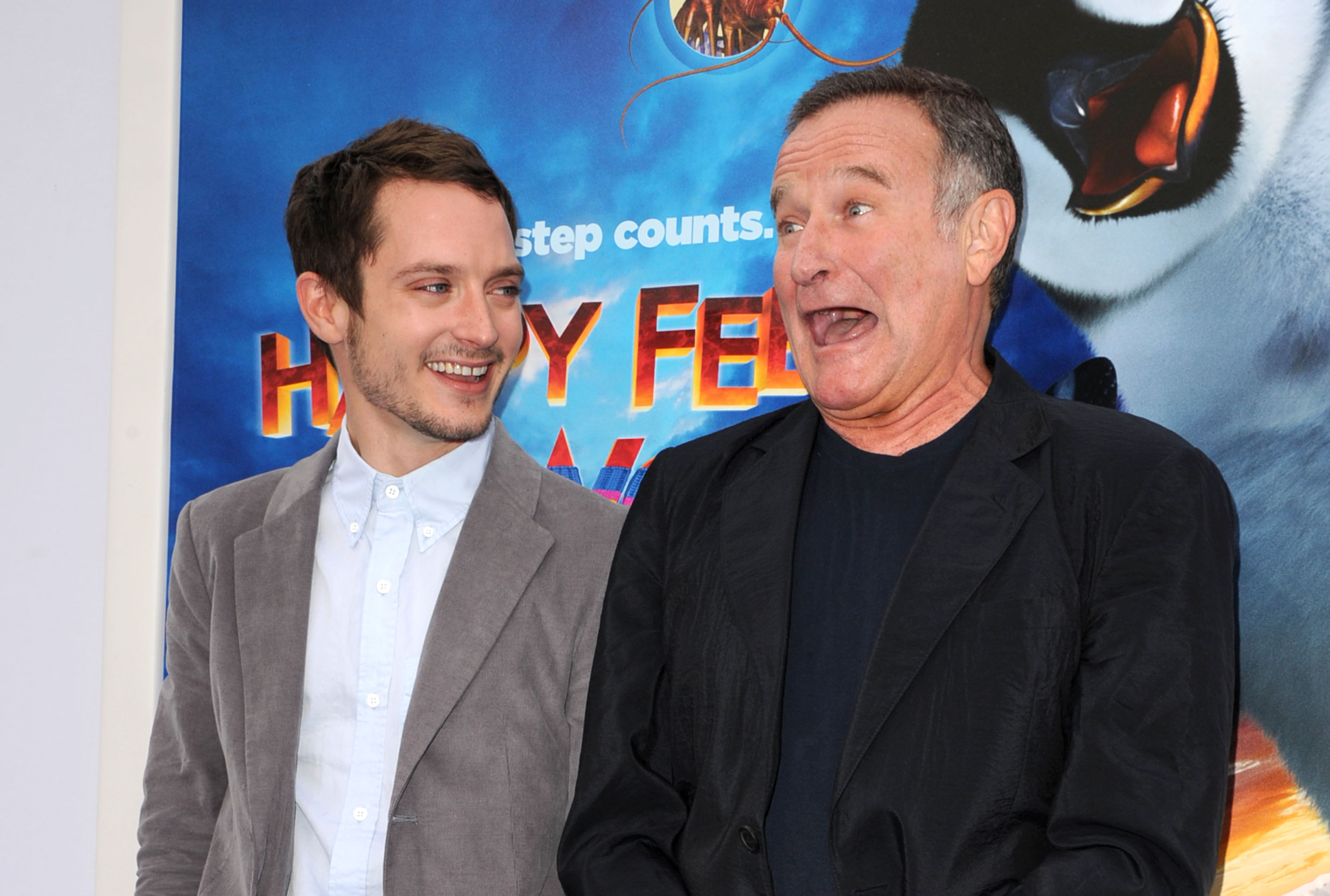 Elijah Wood and Robin Williams at the premiere of "Happy Feet Two" on November 13, 2011, in Hollywood, California. | Source: Getty Images