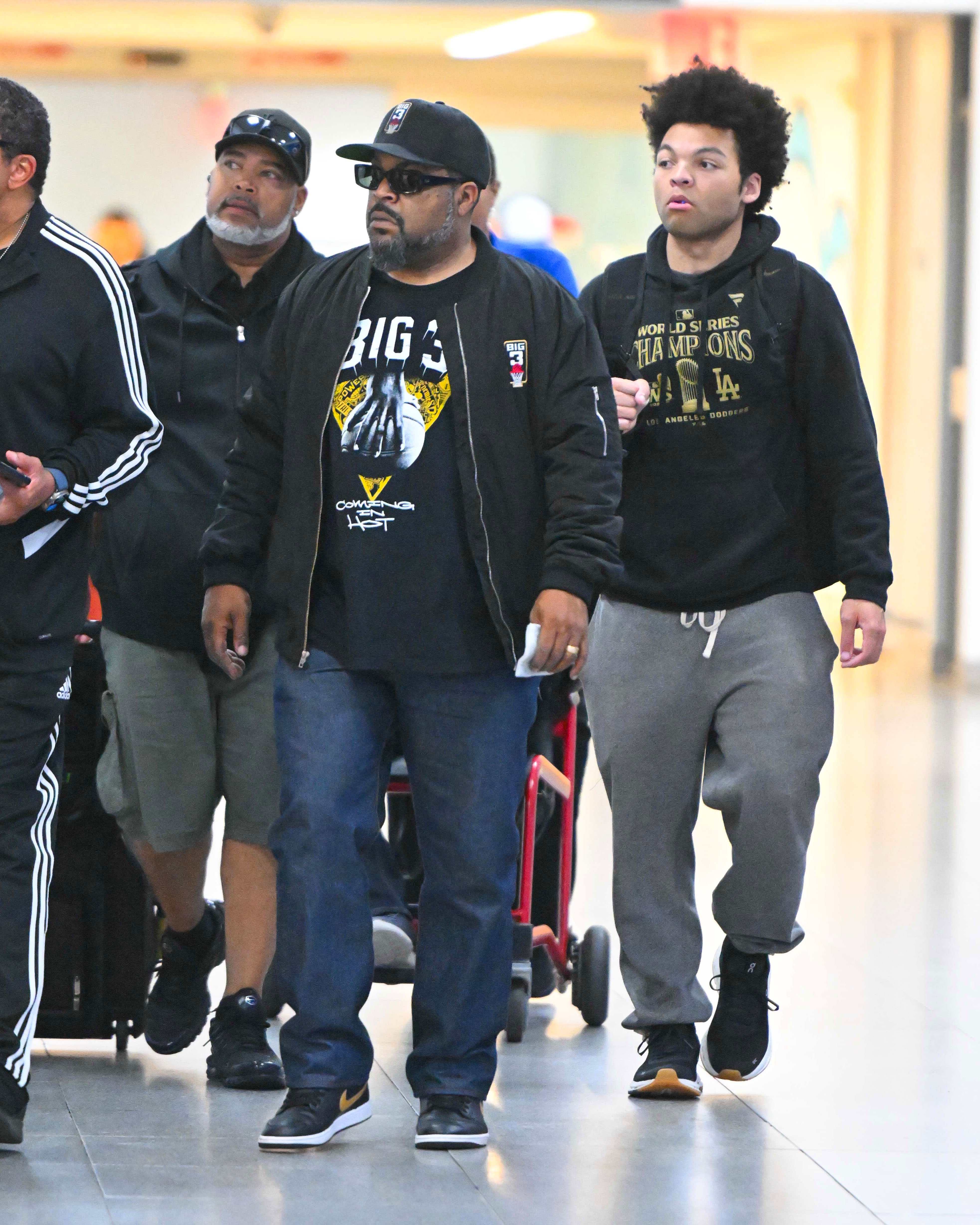 Ice Cube and Shareef Jackson spotted arriving at JFK airport in New York City on June 19, 2025. | Source: Getty Images