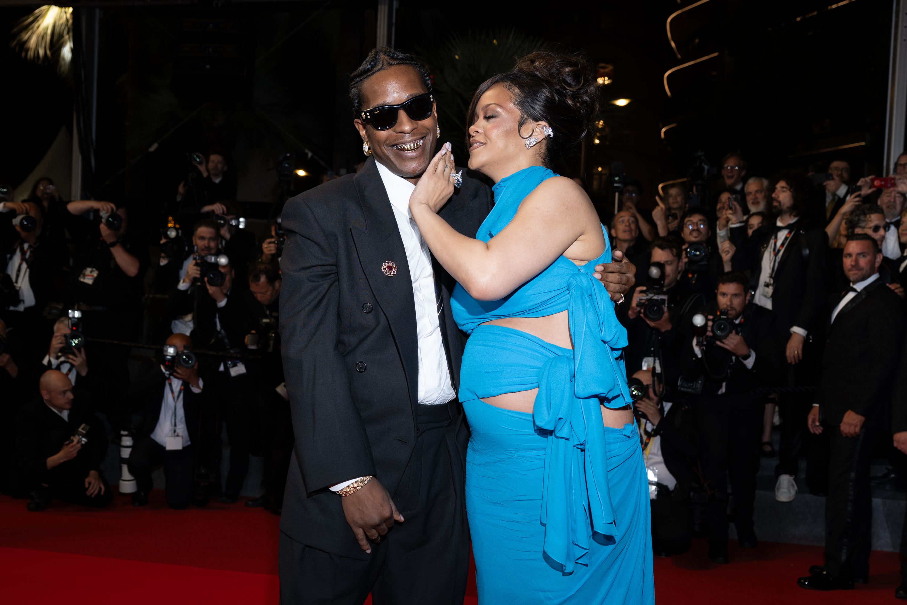 A$AP Rocky and Rihanna depart the "Highest 2 Lowest" red carpet at the 78th annual Cannes Film Festival in Cannes, France, on May 19, 2025 | Source: Getty Images