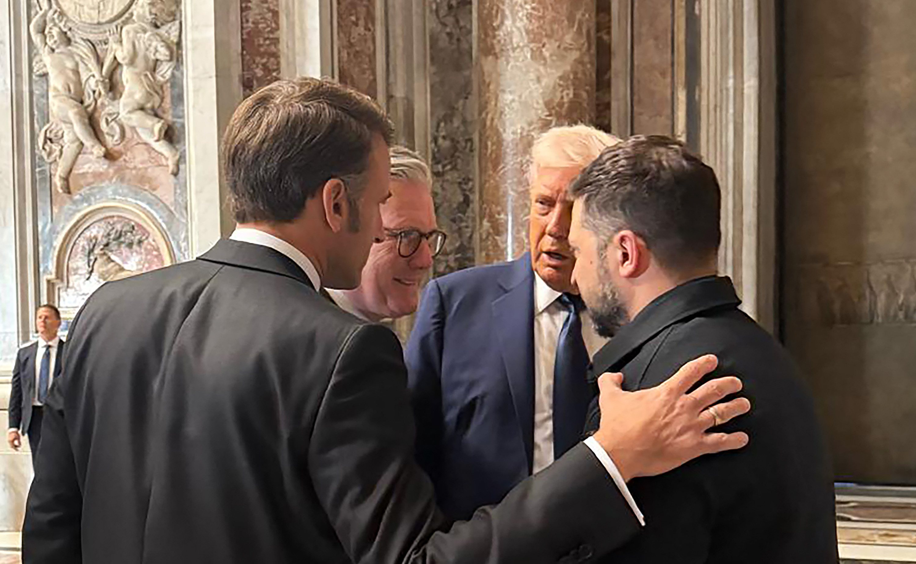French President Emmanuel Macron, British Prime Minister Keir Starmer, U.S. President Donald Trump, and Ukrainian President Volodymyr Zelenskyy at Pope Francis' funeral at St. Peter's Basilica in Vatican City on April 26, 2025. | Source: Getty Images