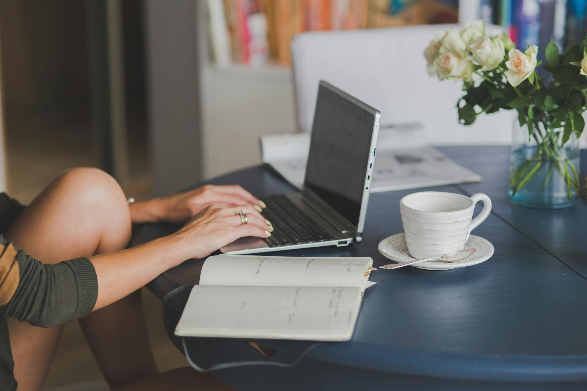 A woman using a laptop at home | Source: Pexels