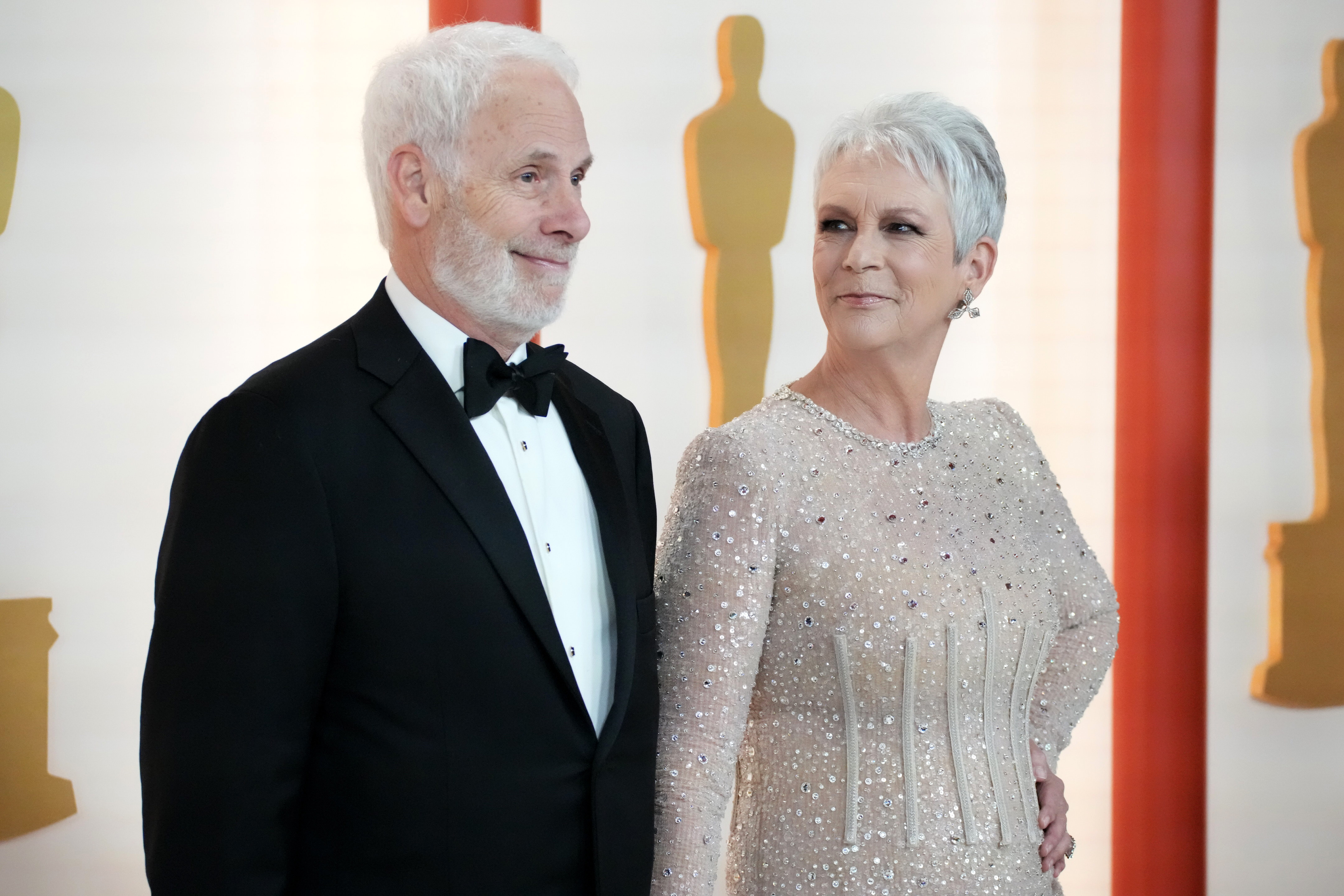 Christopher Guest and Jamie Lee Curtis attend the 95th Annual Academy Awards on March 12, 2023 in Hollywood, California. | Source: Getty Images