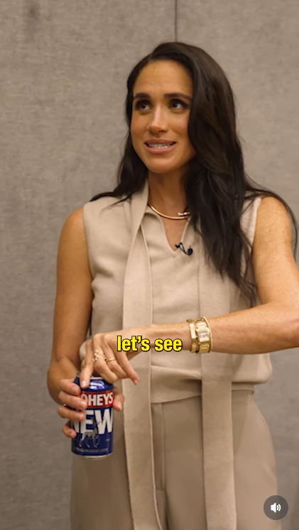 Meghan Markle tries an Australian beer with Sean and Marley. | Source: Instagram/getdownwithseanandmarley