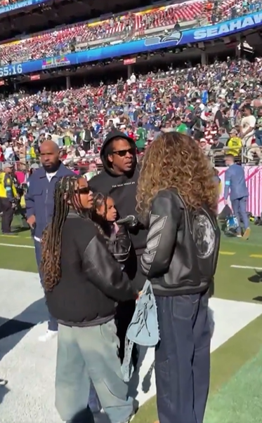 Beyoncé having a discussion with her family, from a post dated February 8, 2026. | Source: X/NFL