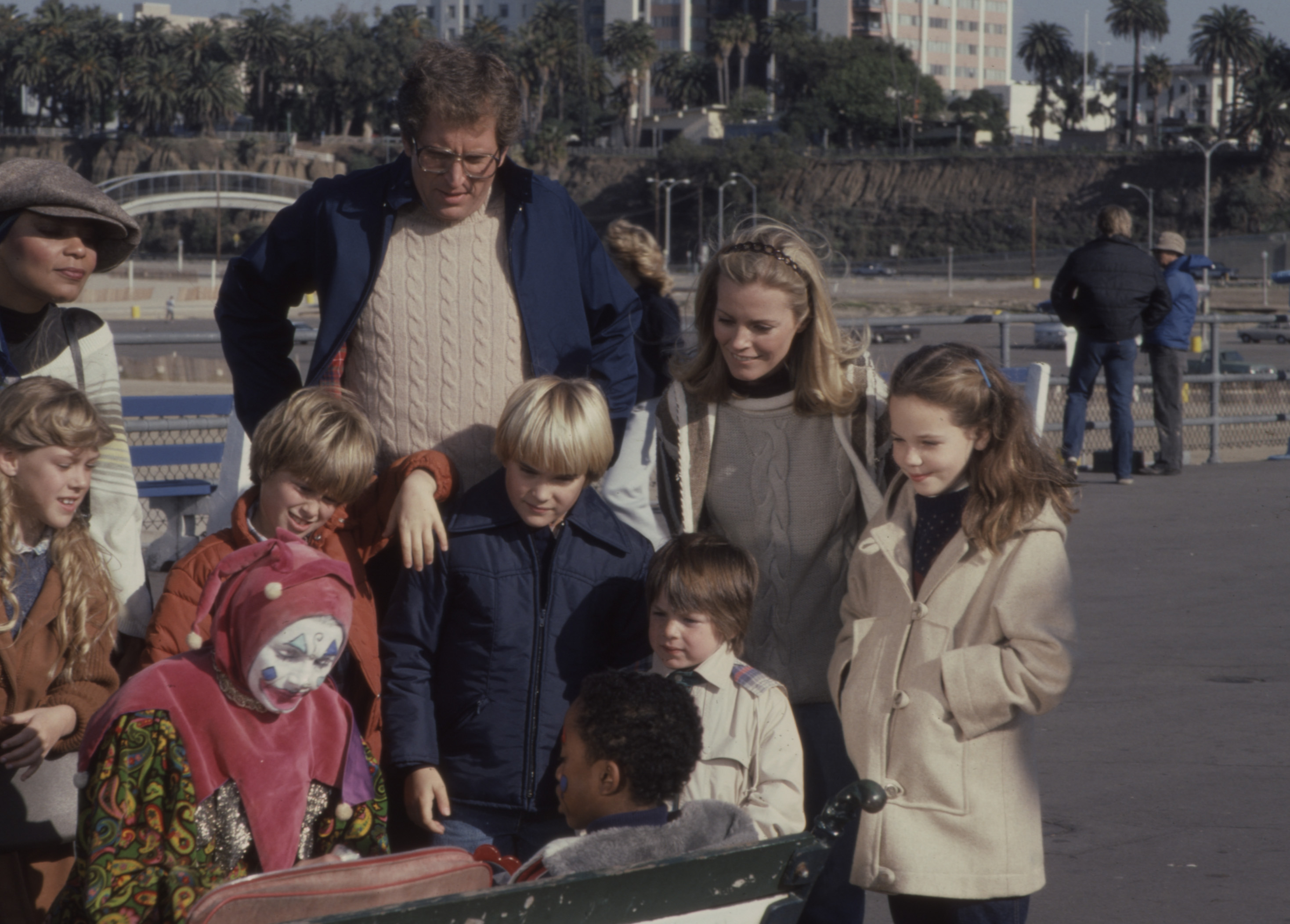 Granville Van Dusen, Cheryl Ladd, the child star, Joshua Harris, Jennie Gassman, and extras appearing in the ABC TV movie "A Death in California" on May 12, 1985 | Source: Getty Images