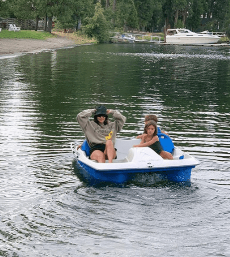 Kourtney and her children boating | Instagram: @kourtneykardash