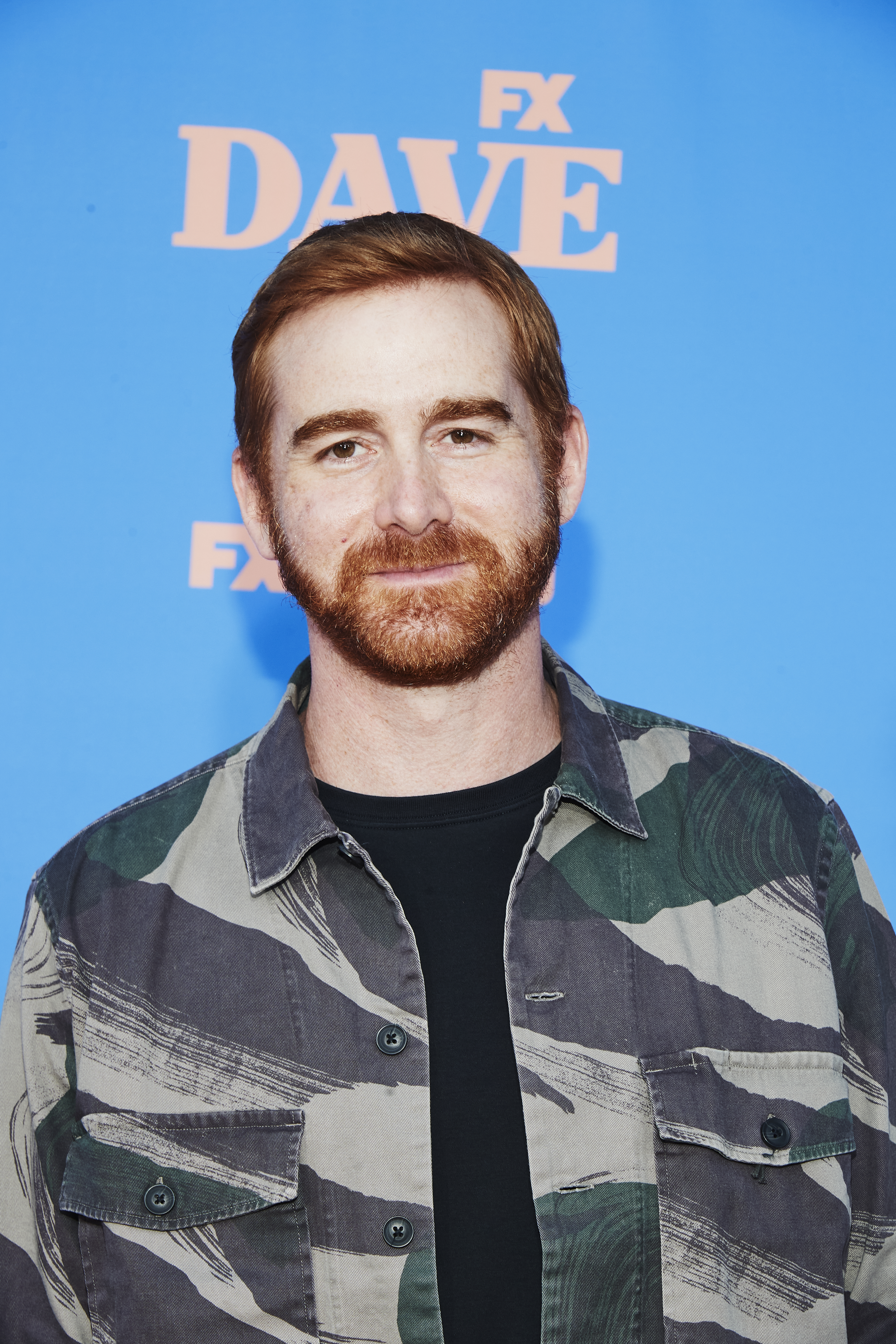 Actor Andrew Santino arrives at the premiere of FXX’s "Dave" at The Greek Theatre on June 10, 2021 in Los Angeles, California | Source: Getty Images
