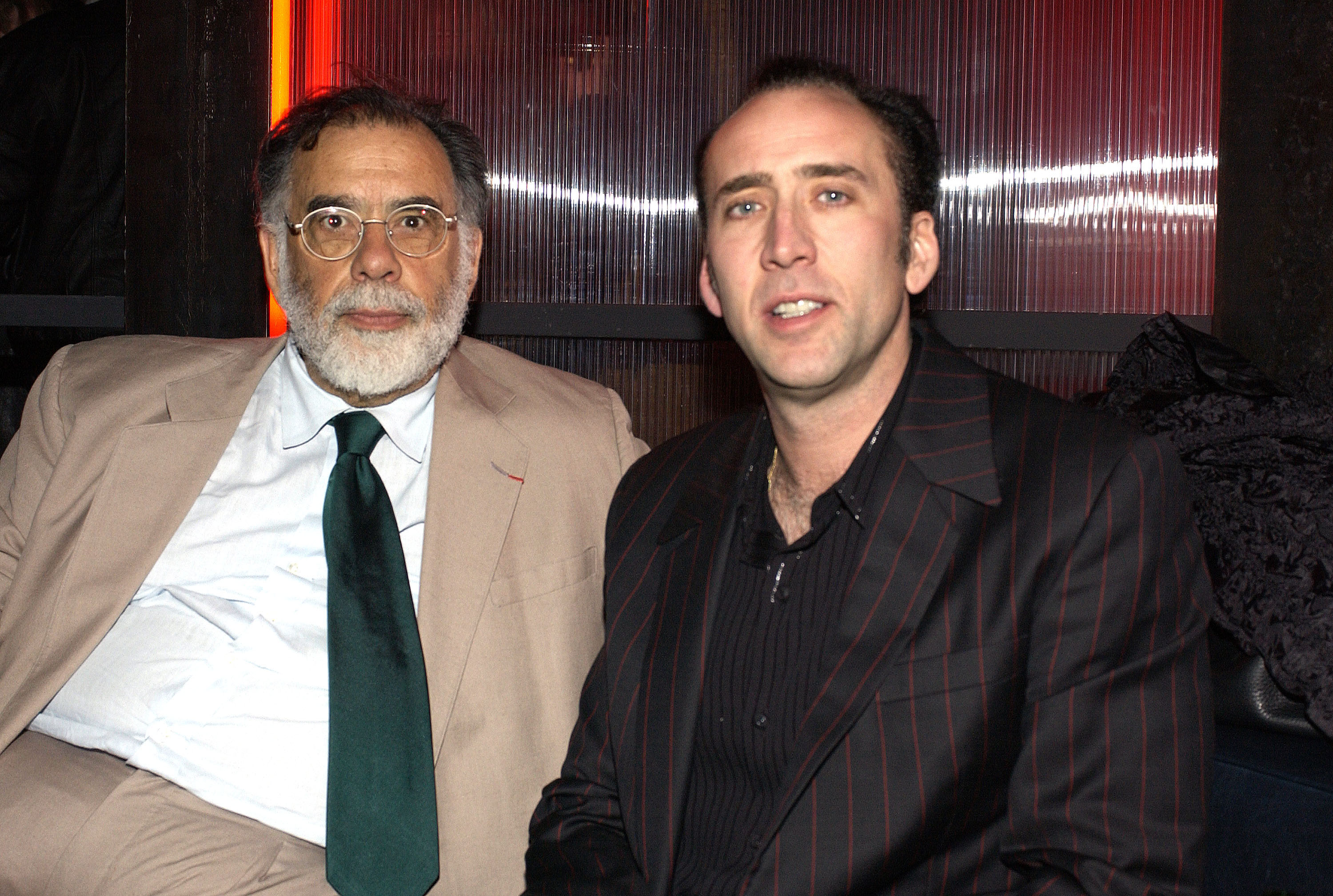 Francis Ford Coppola and Nicolas Cage at an after-party on March 17, 2003, in Hollywood, California. | Source: Getty Images