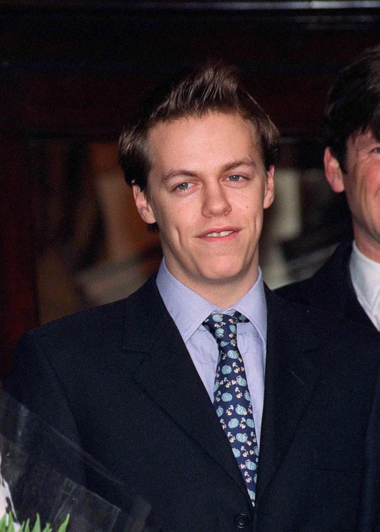 Photo of the boy attending his father's wedding on February 7, 1996. | Source: Getty Images