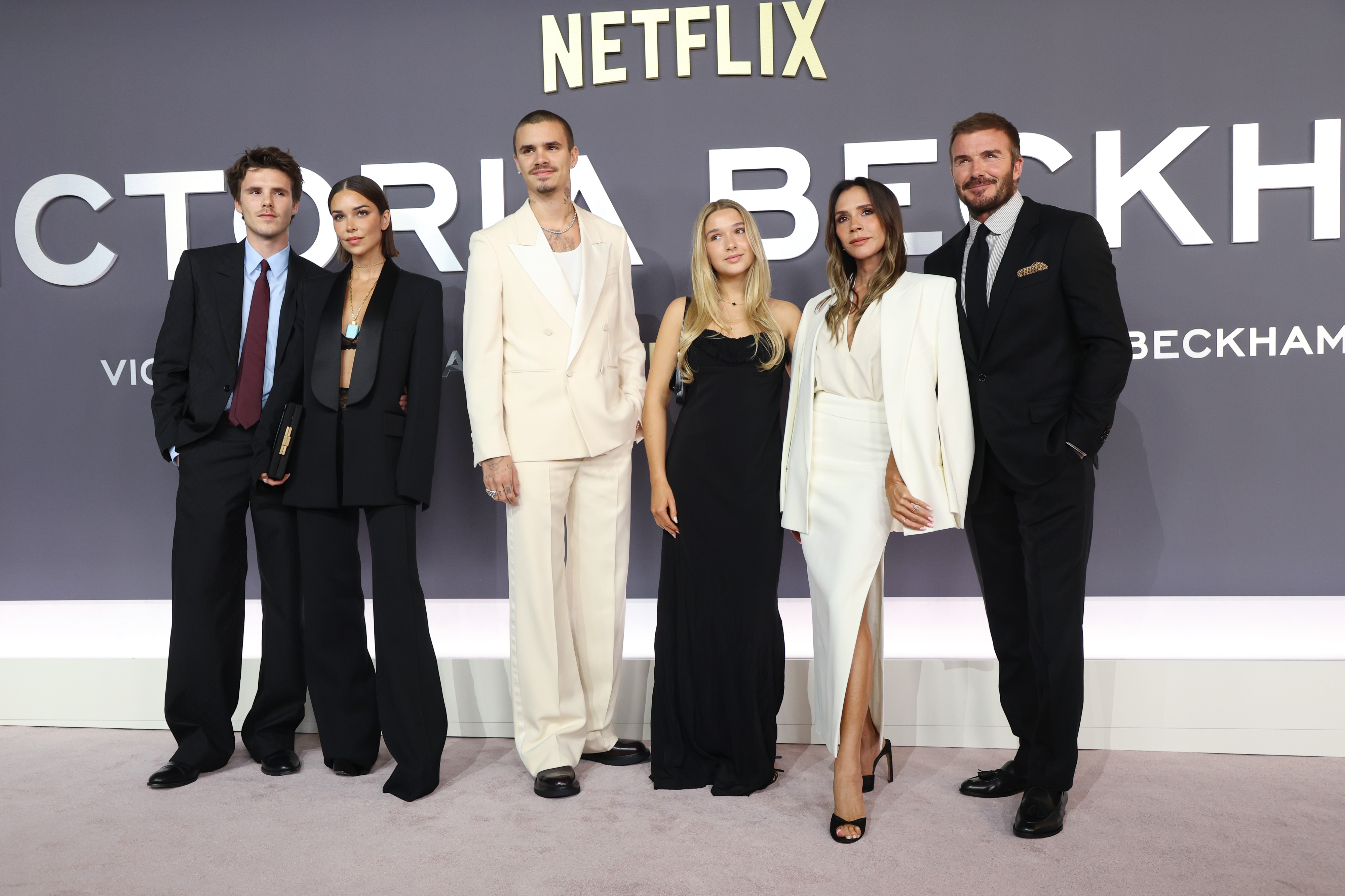 Cruz Beckham, Jackie Apostel, Romeo Beckham, Harper Beckham, Victoria Beckham, and David Beckham at Netflix's "Victoria Beckham" world premiere held at Curzon Mayfair on 8 October 2025 in London, England. | Source: Getty Images