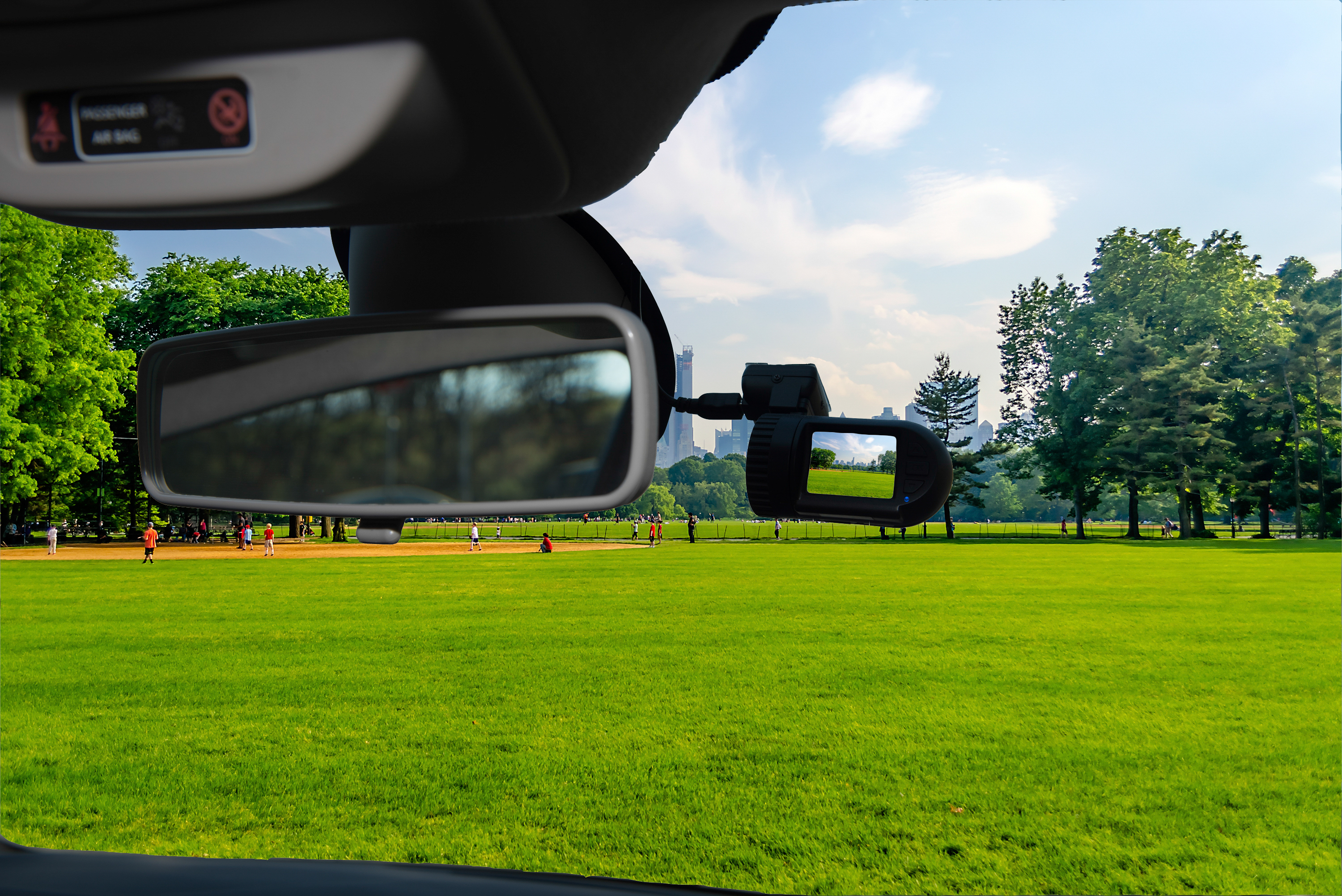 A dashcam car camera installed on a windshield | Source: Getty Images