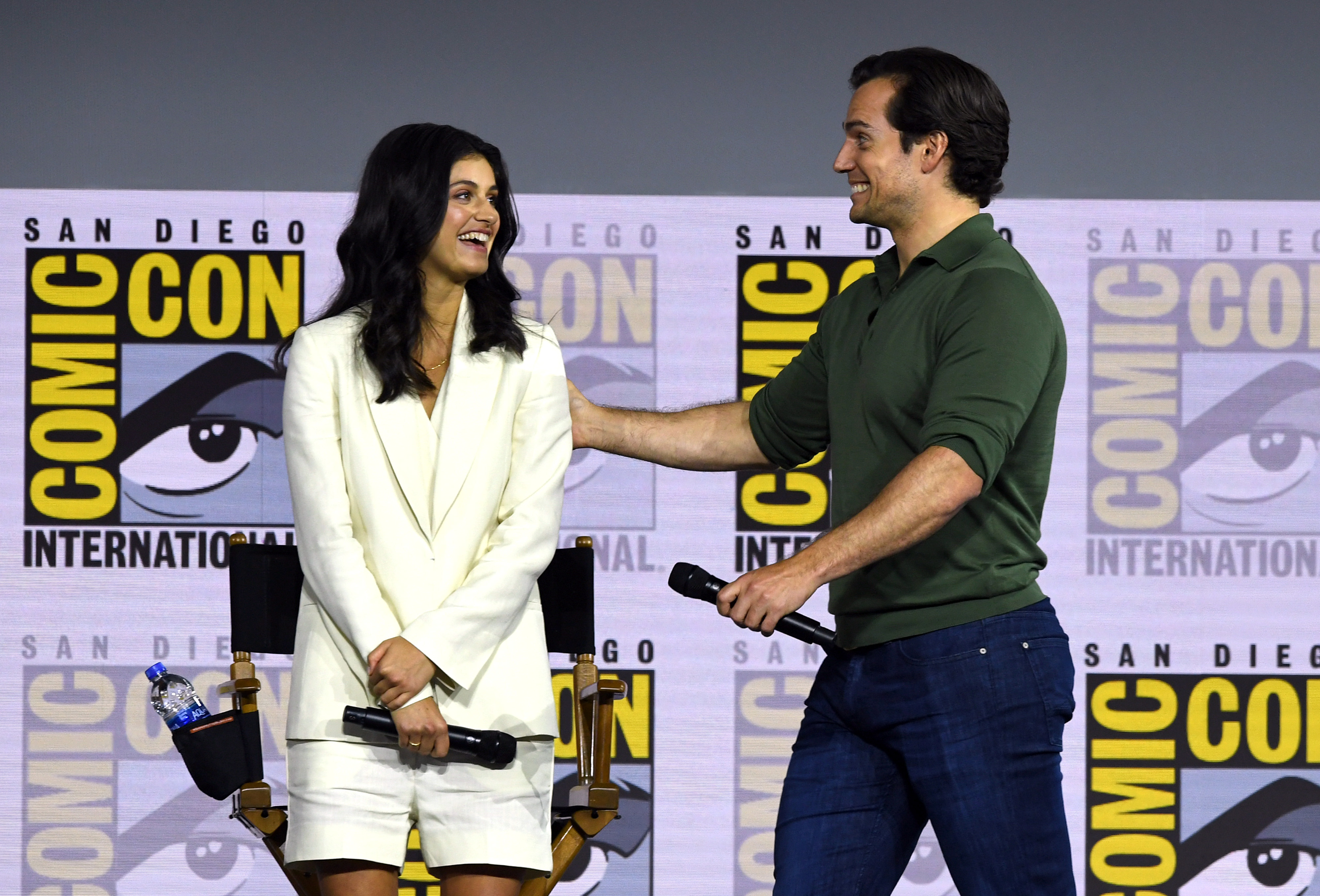 Anya Chalotra and Henry Cavill speak at "The Witcher:" A Netflix Original Series Panel during 2019 Comic-Con International at San Diego Convention Center, on July 19, 2019, in San Diego, California. | Source: Getty Images