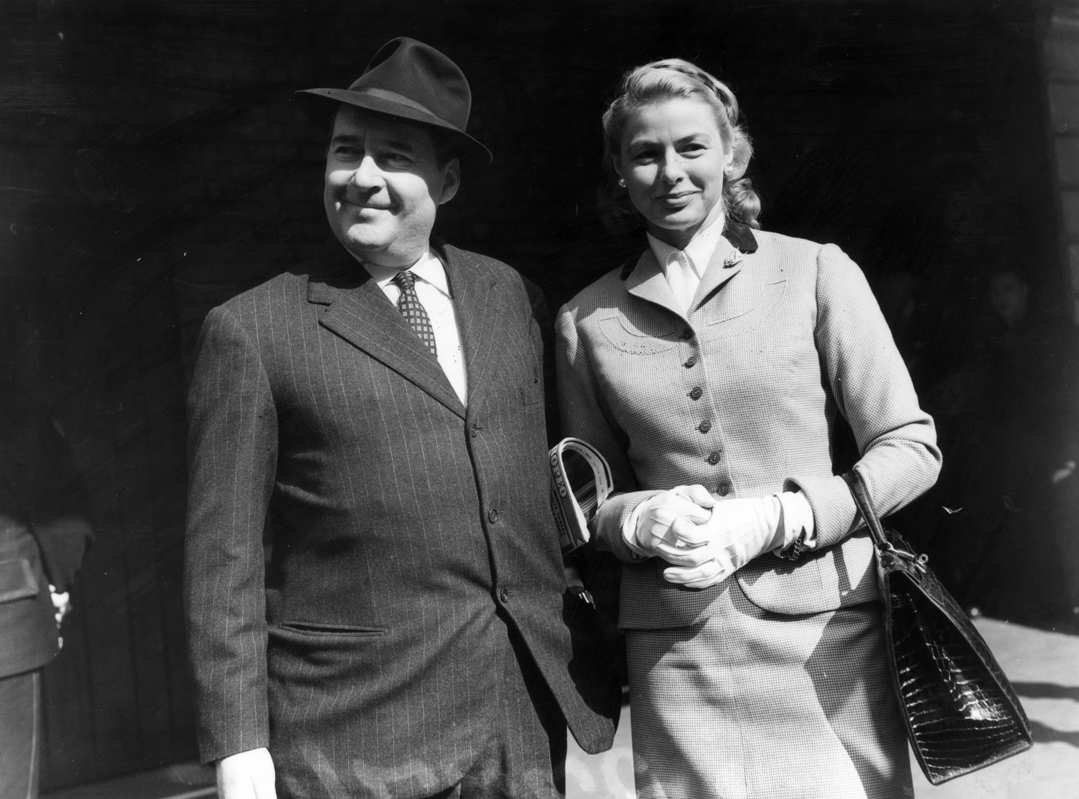 Actress Ingrid Bergman with her second husband Roberto Rossellini at London's Victoria Station on MAY 23 1956 | Source: Getty Images