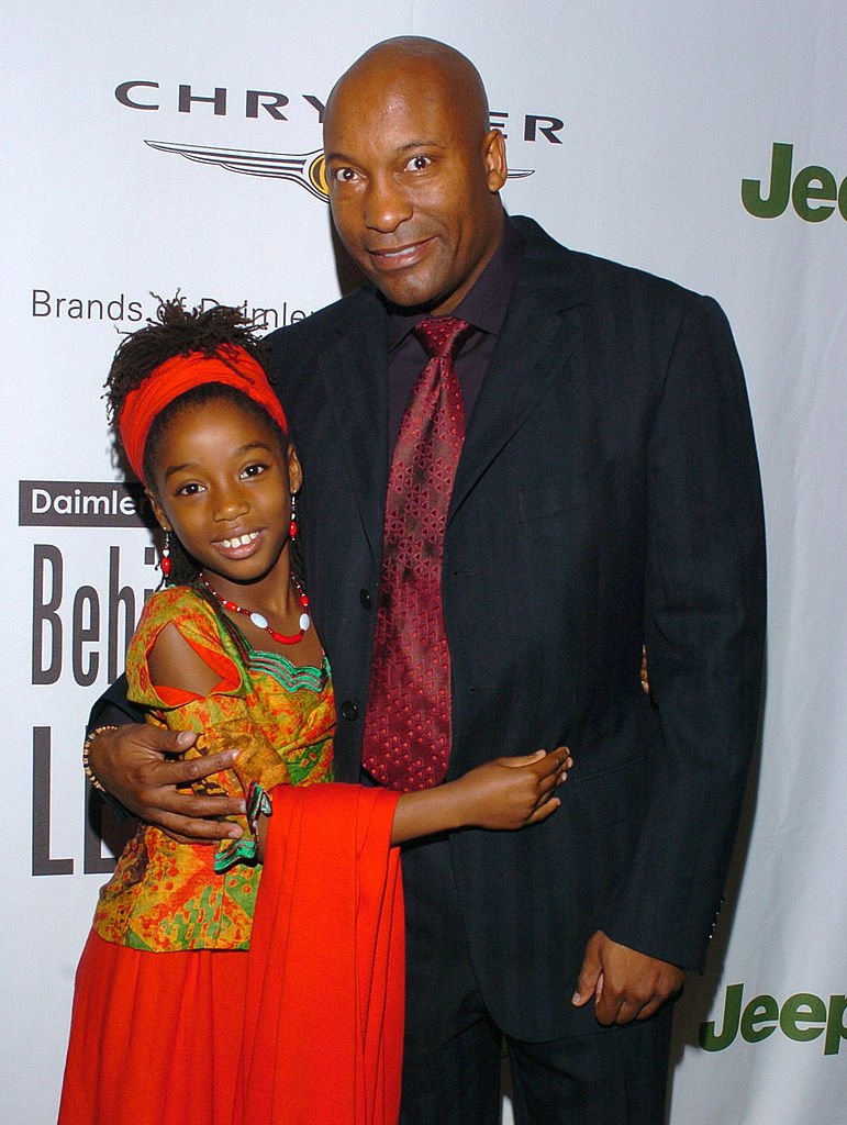 John Singleton and Hadar Busia-Singleton at the 2005 DaimlerChrysler "Behind The Lens" Awards at Beverly Hills Hotel | Source: Getty Images