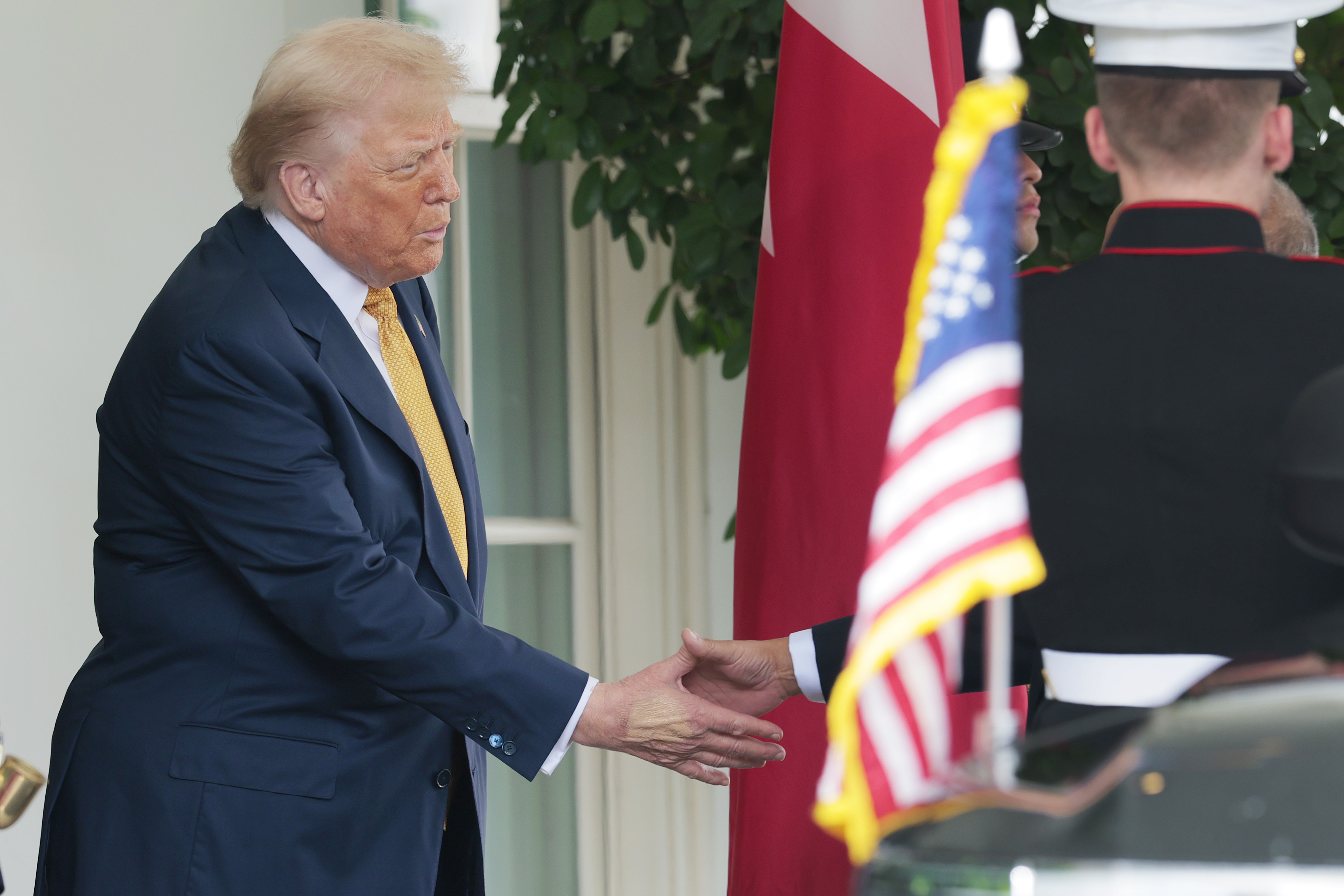 Donald Trump welcomes Crown Prince Salman bin Hamad Al Khalifa of Bahrain outside the west wing of the White House on July 16, 2025 | Source: Getty Images