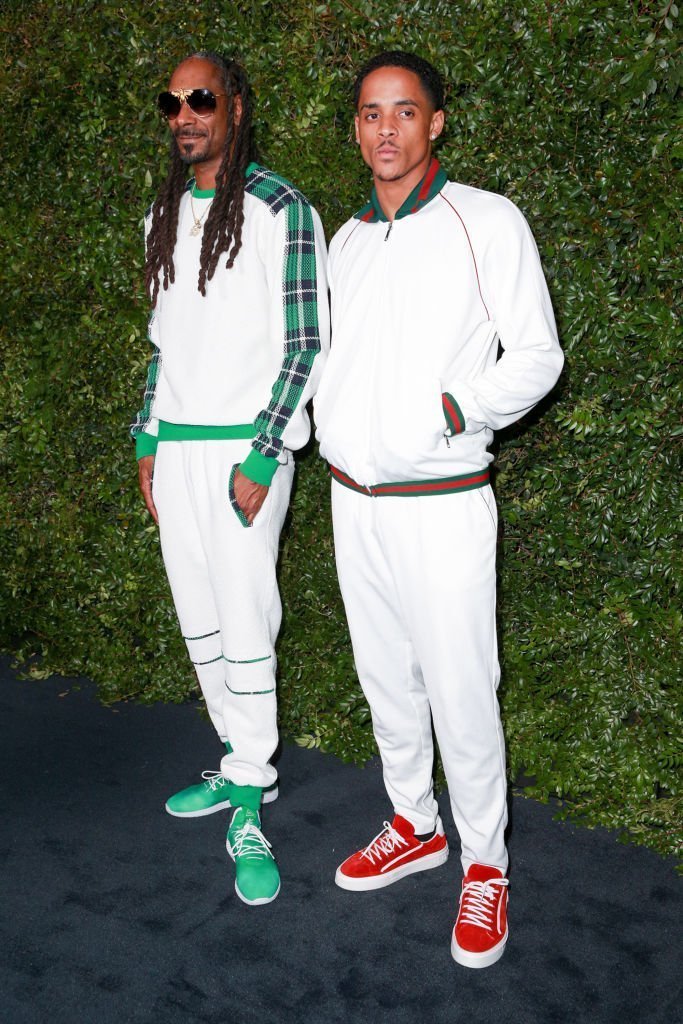 Snopp Dogg (L), wearing Chanel, and Cordell Broadus attend Chanel Dinner Celebrating our Majestic Oceans, A Benefit for NRDC at Private Residence on June 2, 2018 in Malibu, California | Photo: Getty Images