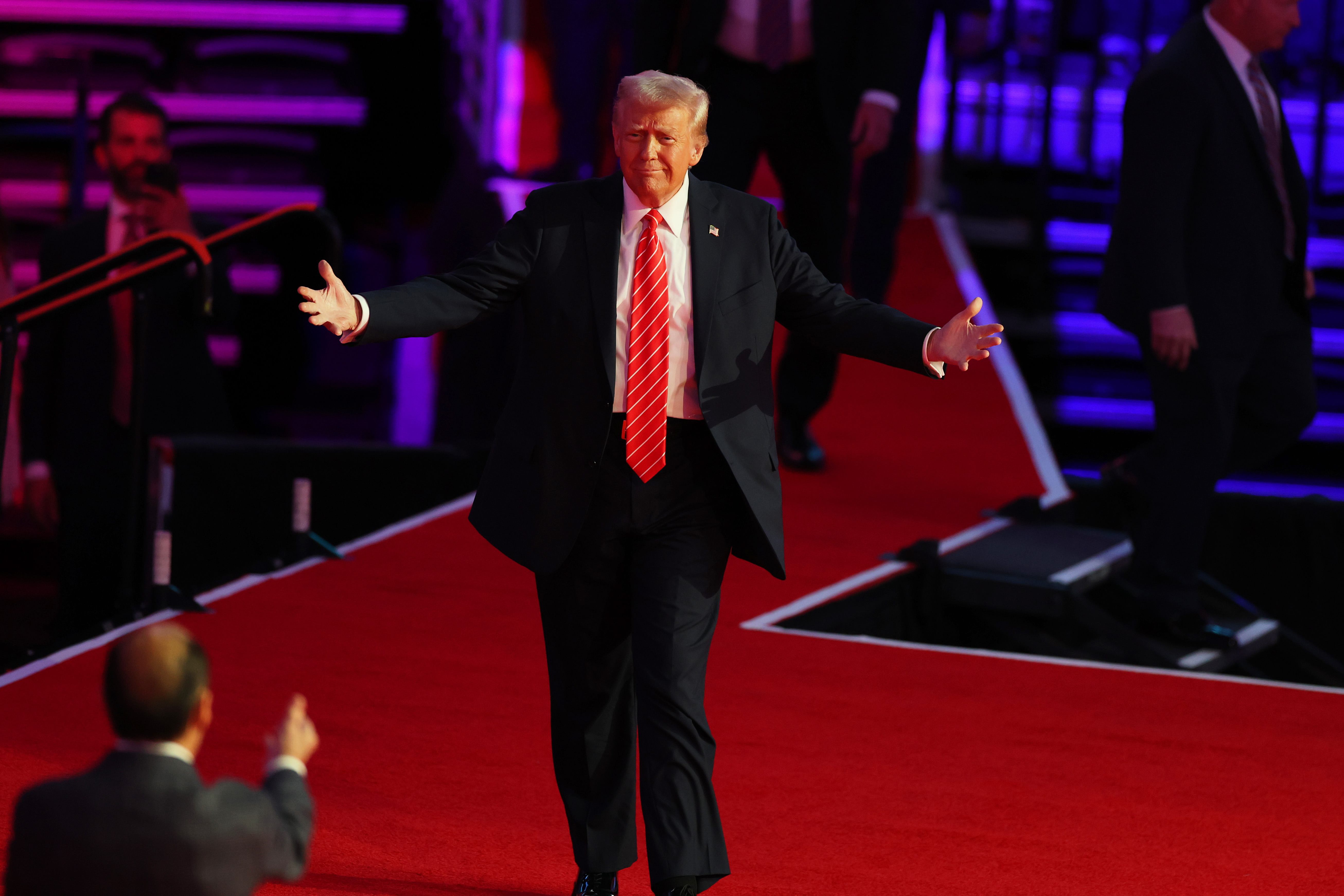 Donald Trump walking on stage during his victory rally. | Source: Getty Images