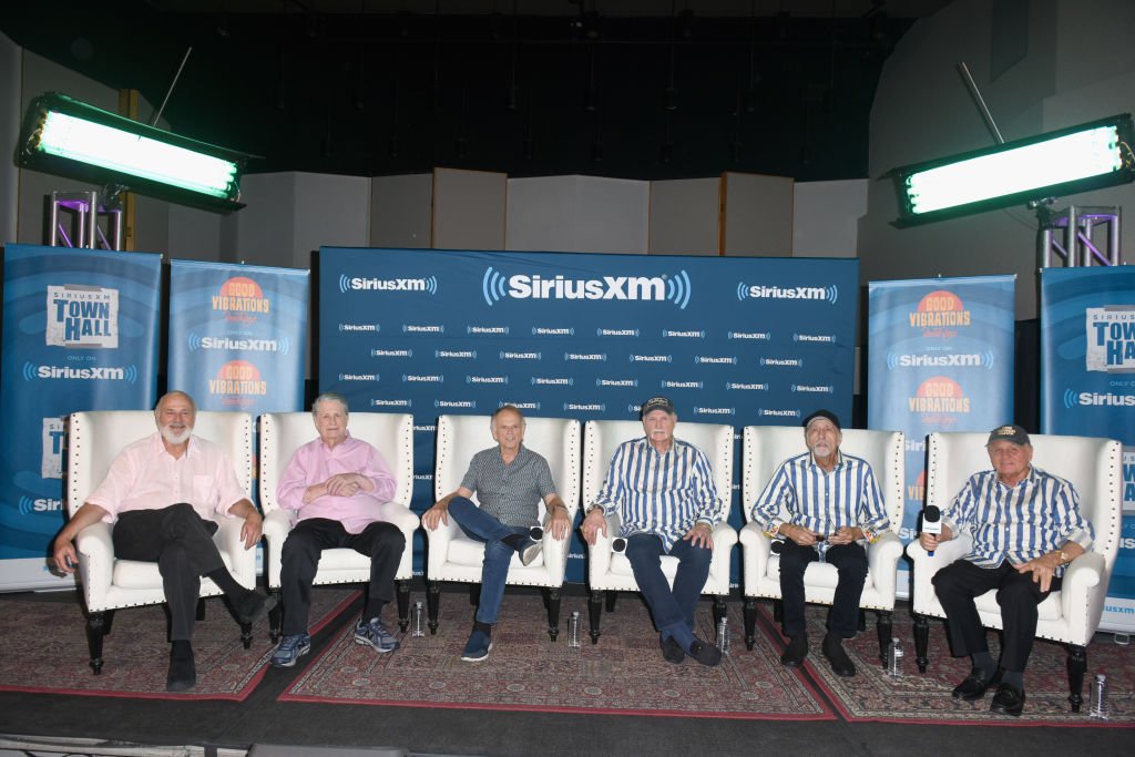 Rob Reiner, Brian Wilson, Al Jardine, Mike Love, David Marks and Bruce Johnston of The Beach Boys speak onstage during SiriusXM's Town Hall with The Beach Boys moderated by Rob Reiner from the Capitol Studios on July 30, 2018 | Photo: Getty Images