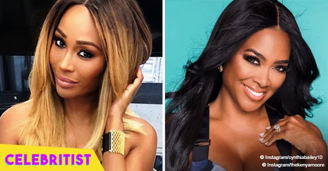 Kenya Moore flaunts baby bump in tight white dress in recent picture with Cynthia Bailey