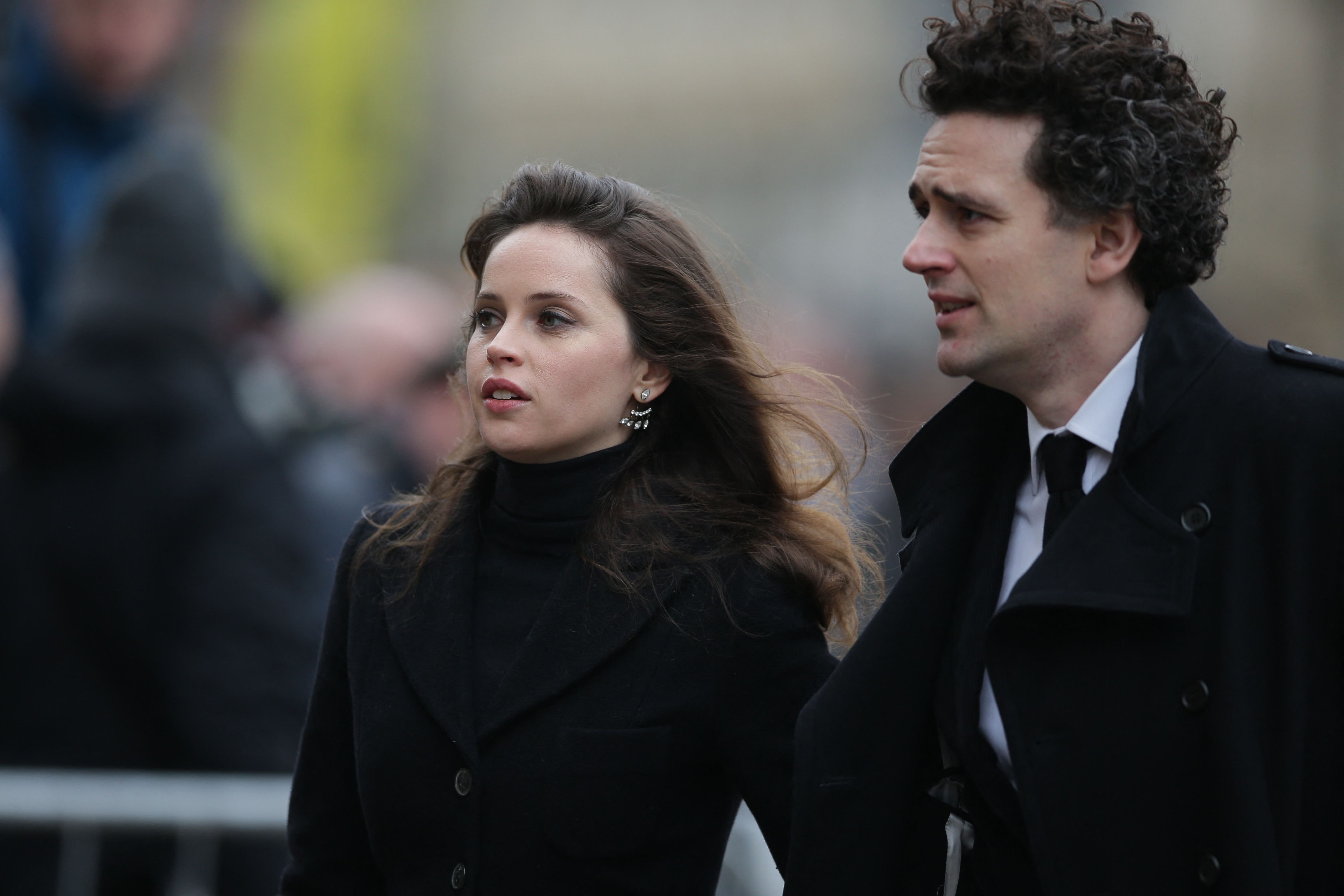 Felicity Jones and Charles Guard at the funeral of British scientist Stephen Hawking in Cambridge on March 31, 2018. | Source: Getty Images 