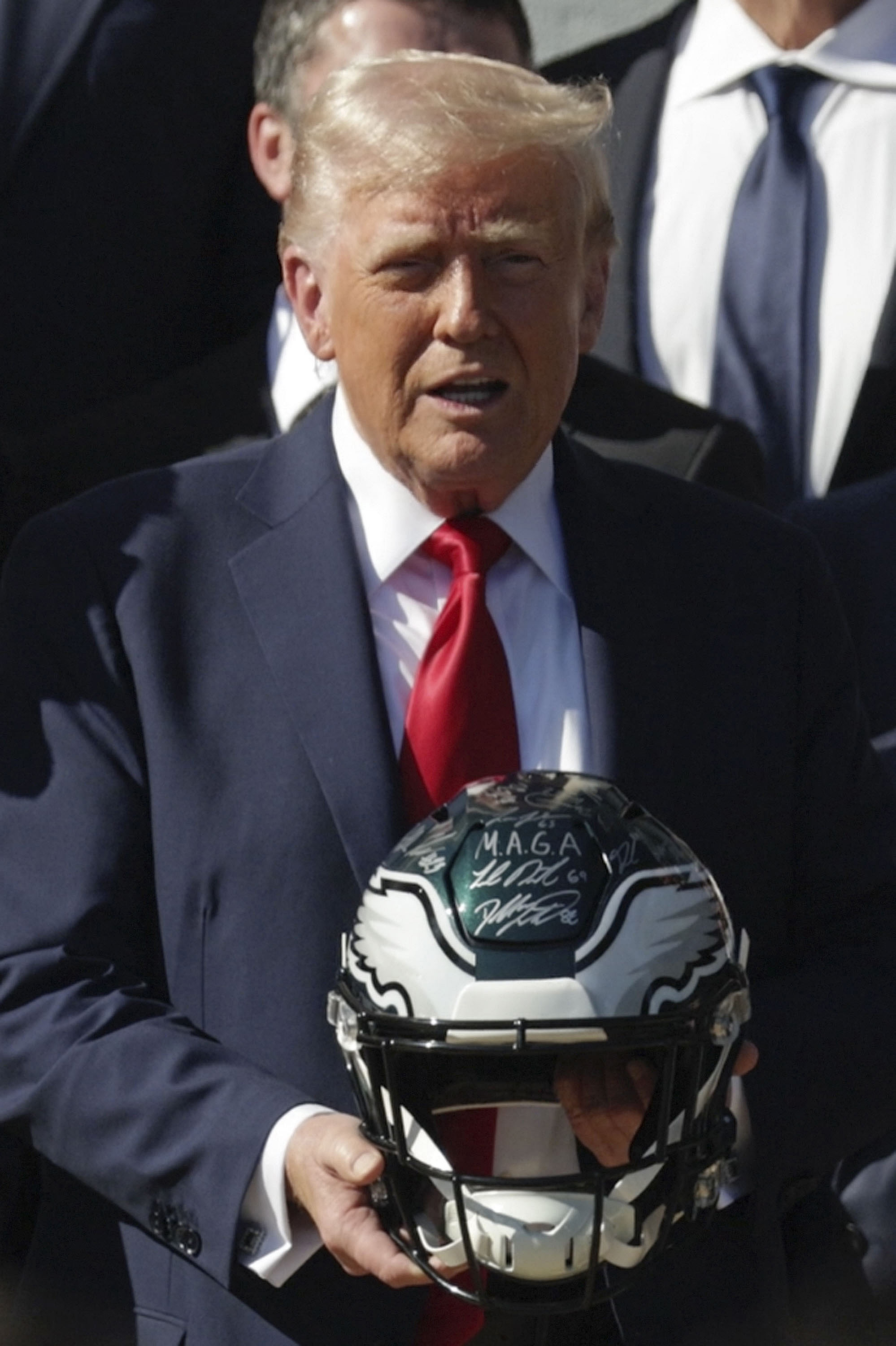 U.S. President Donald Trump holds an NFL Philadelphia Eagles helmet during an event on the South Lawn of the White House on April 28, 2025, in Washington, D.C. | Source: Getty Images